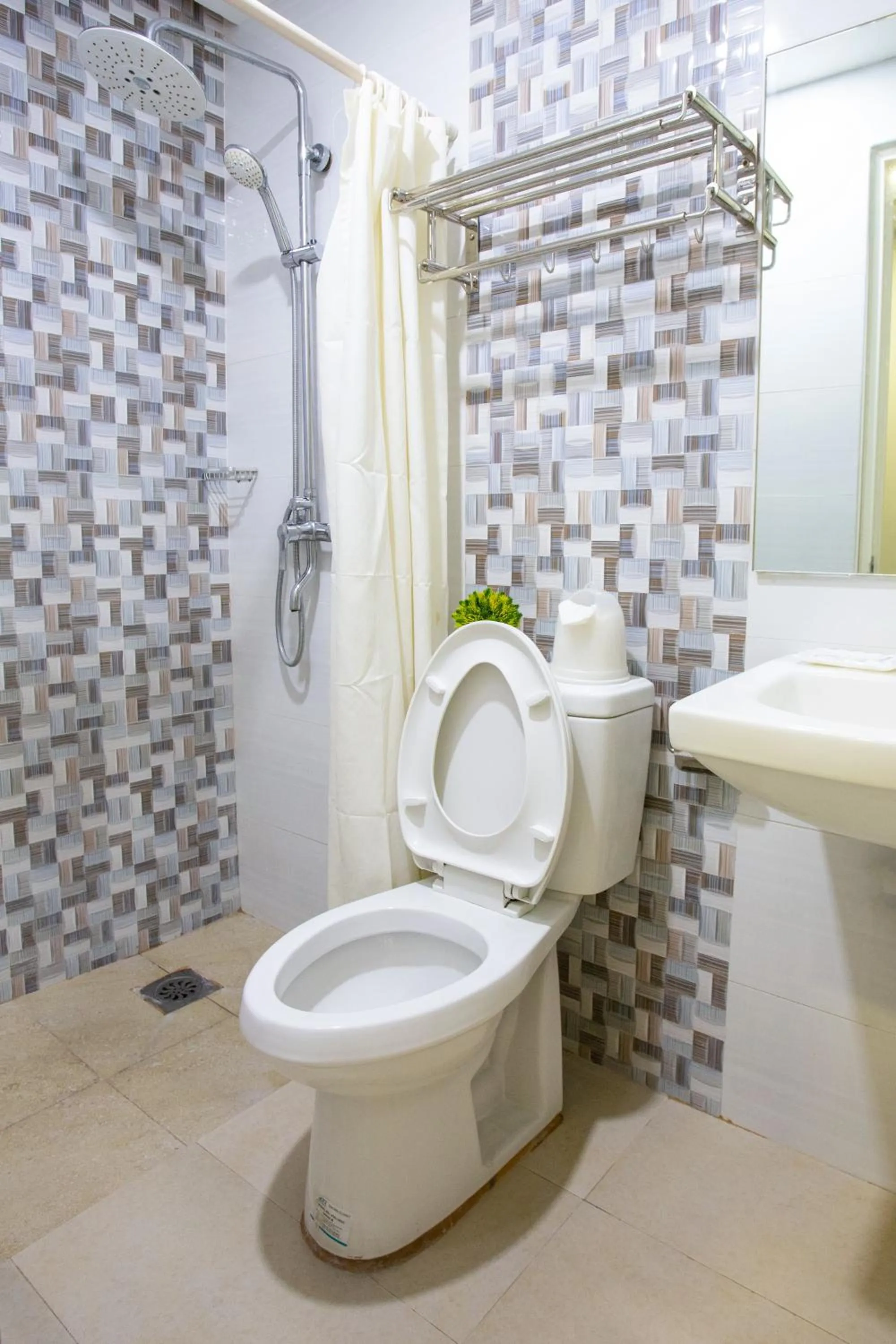 Shower in The Rooms by Alinace at Mango Hotel