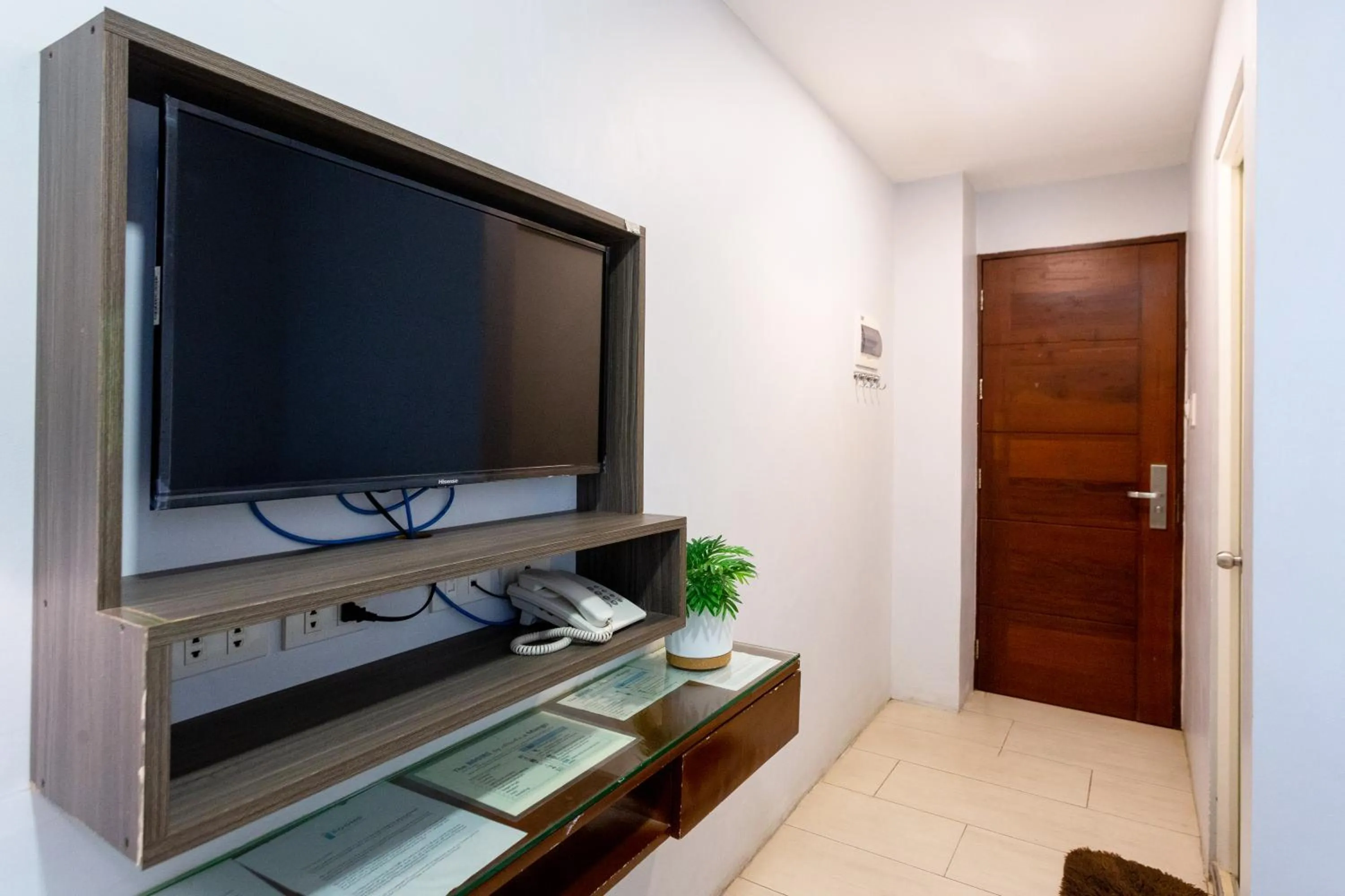 Communal lounge/ TV room in The Rooms by Alinace at Mango Hotel