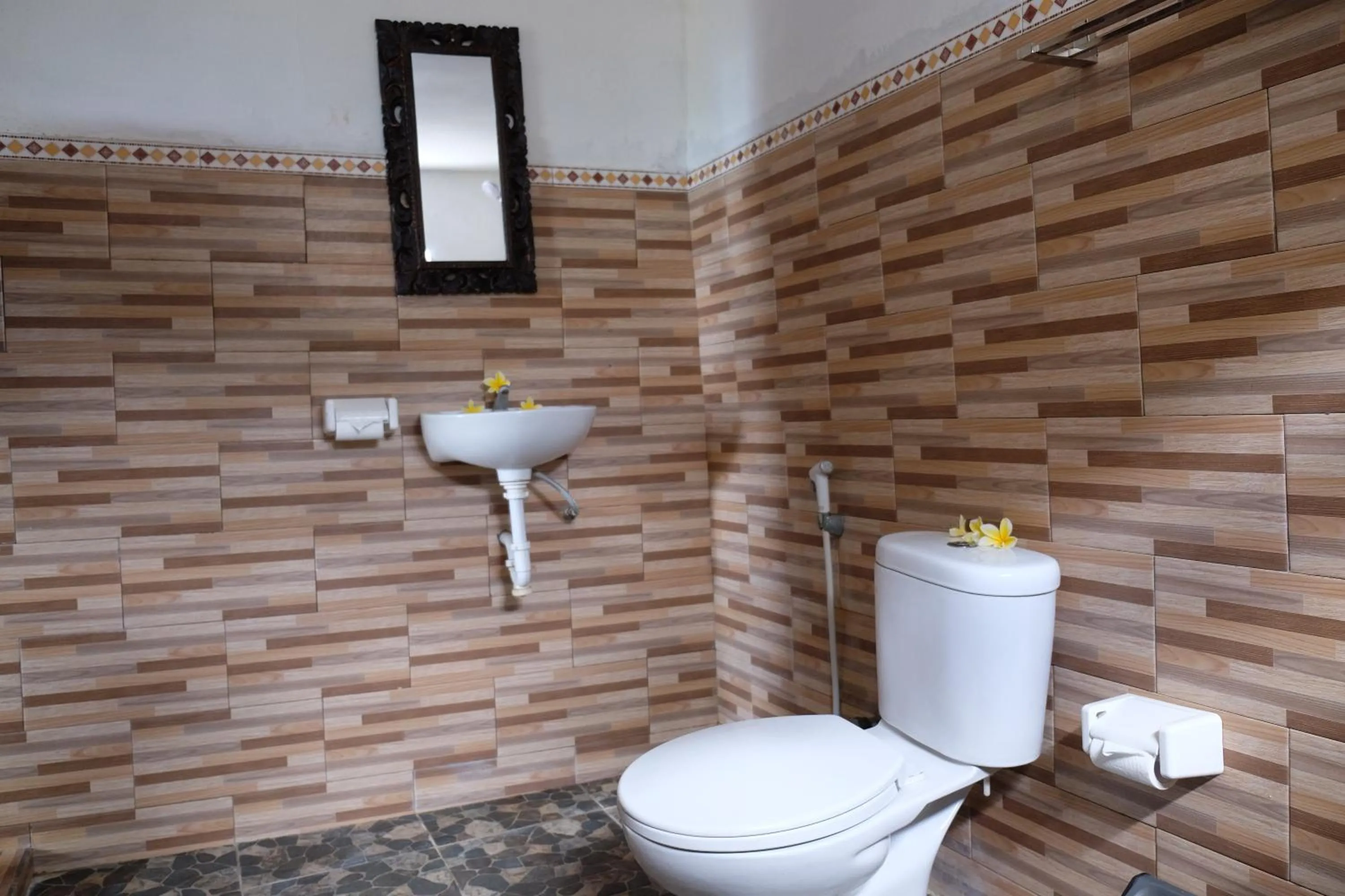 Toilet in Kibu Kauh Sunrise Cottage