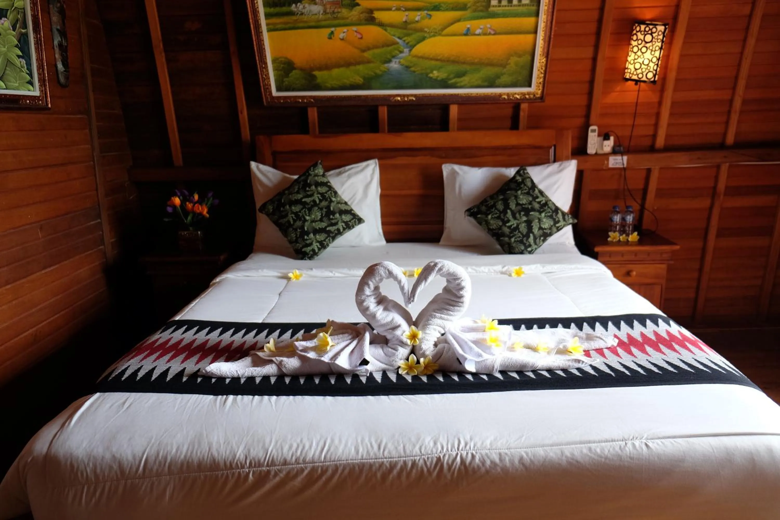 Bed in Kibu Kauh Sunrise Cottage