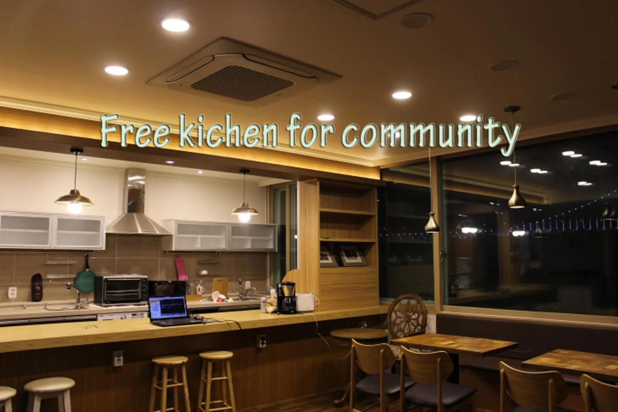 Communal lounge/ TV room in Bexco Hostel B&B