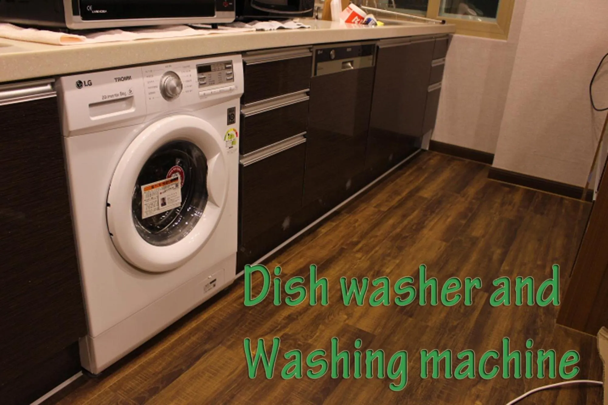 Kitchen or kitchenette in Bexco Hostel B&B