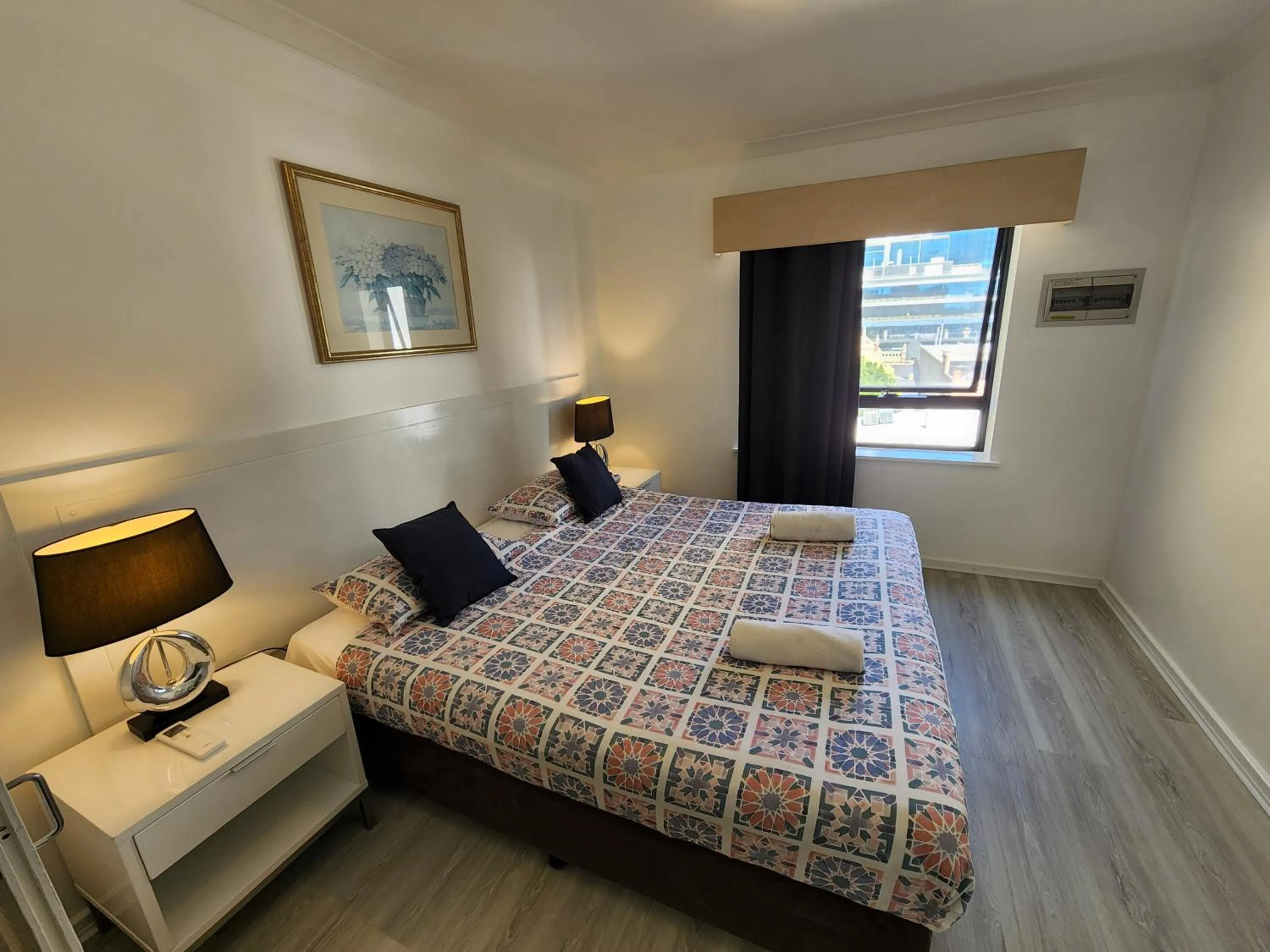 Bed in PERTH CBD APARTMENTS