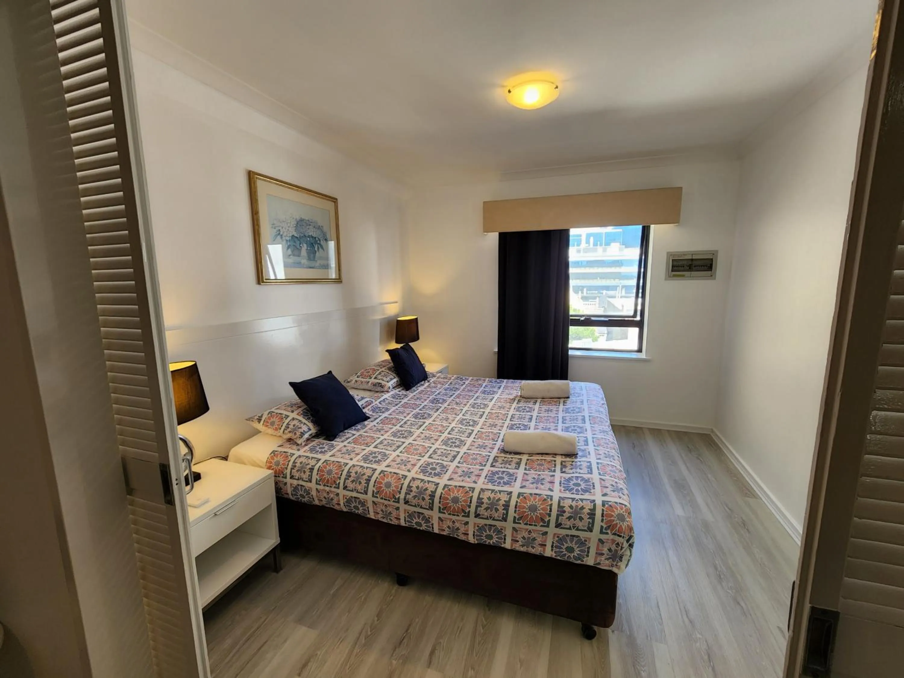 Bed in PERTH CBD APARTMENTS