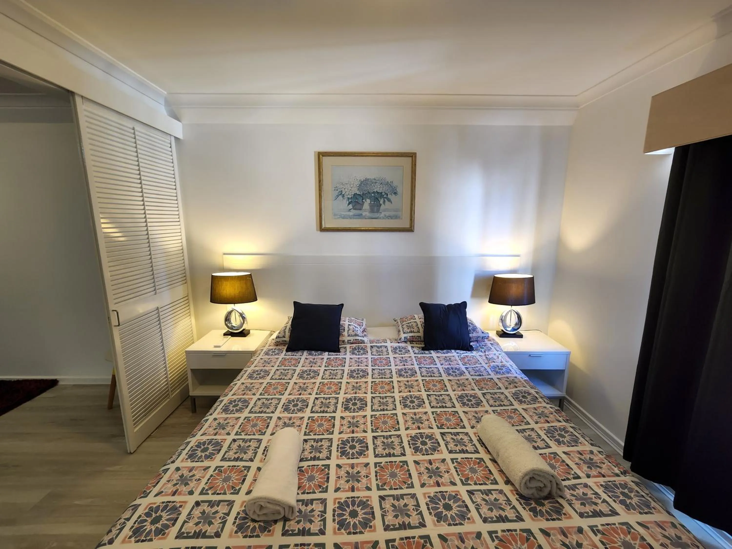 Bed in PERTH CBD APARTMENTS