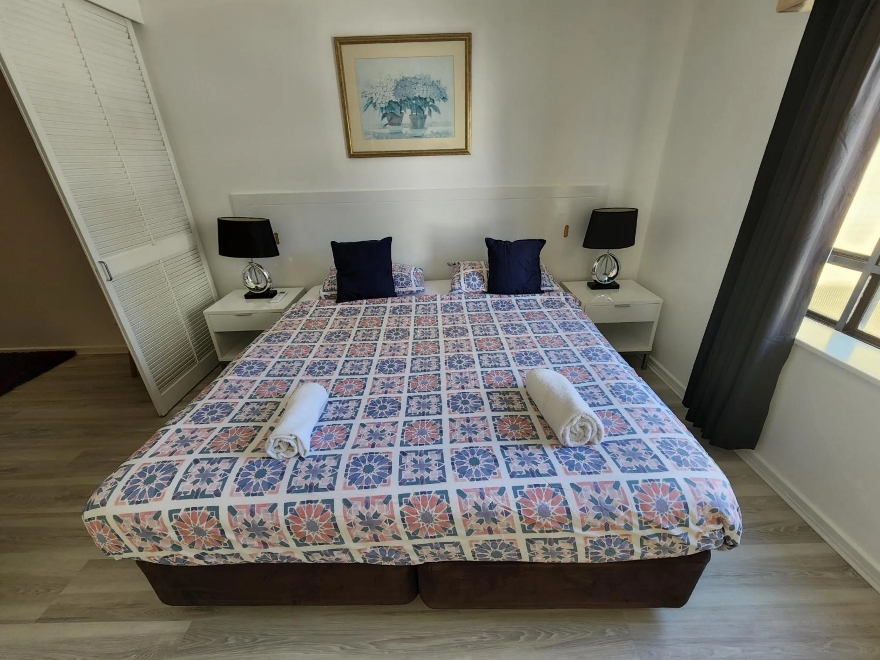 Bed in PERTH CBD APARTMENTS