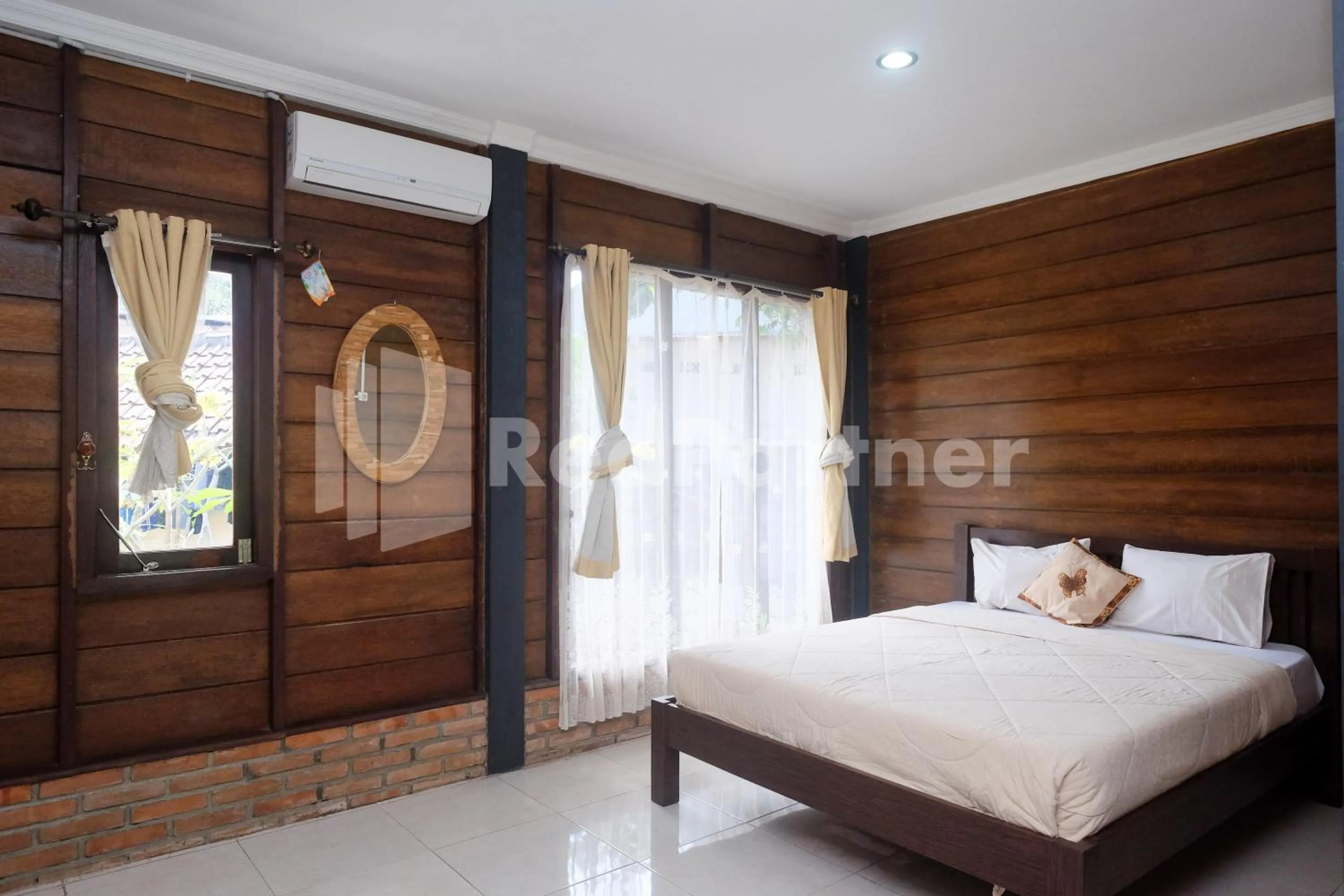 Bed in Kebon Krapyak Cottage Syariah Mitra RedDoorz near Stadion Maguwoharjo