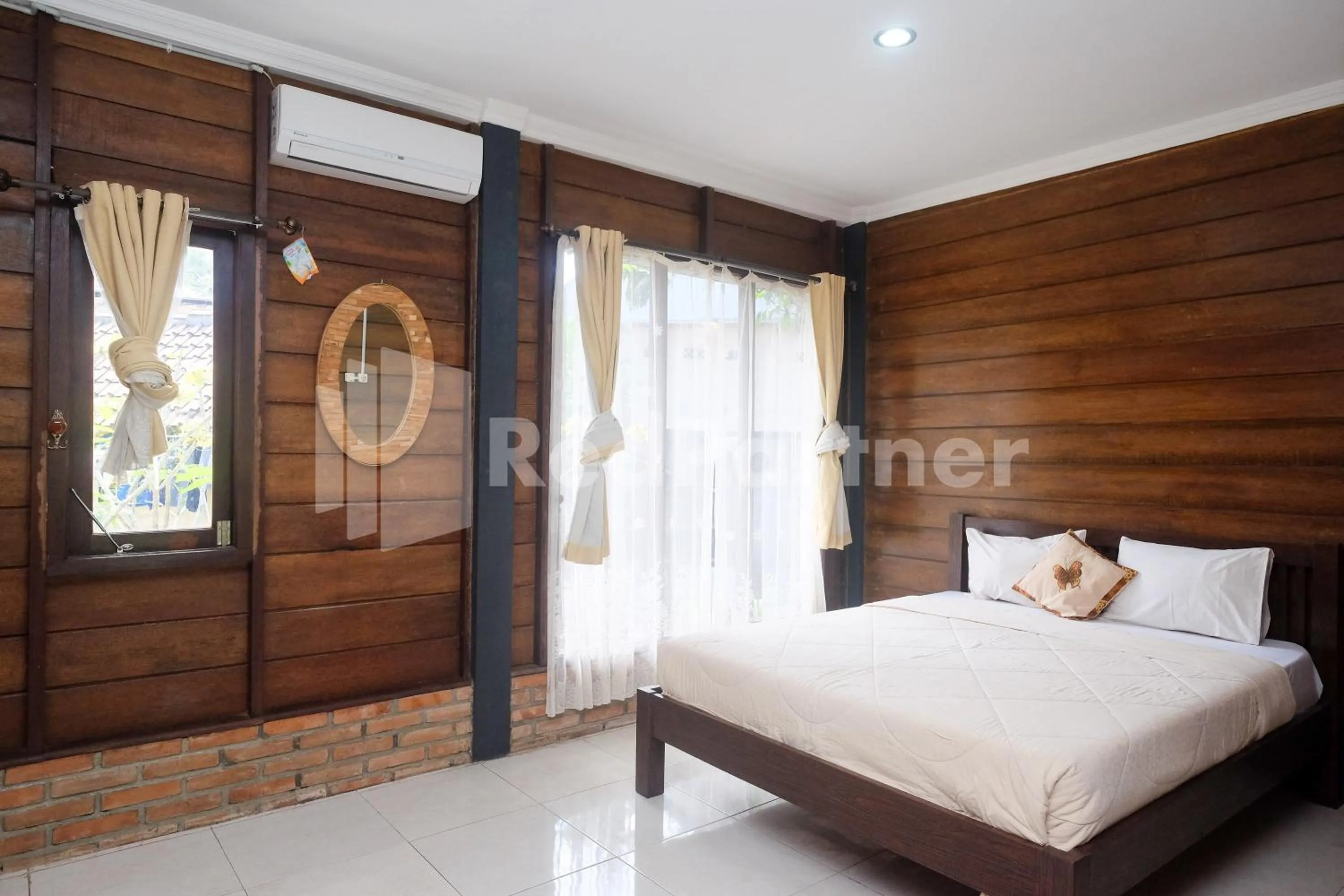 Bed in Kebon Krapyak Cottage Syariah Mitra RedDoorz near Stadion Maguwoharjo