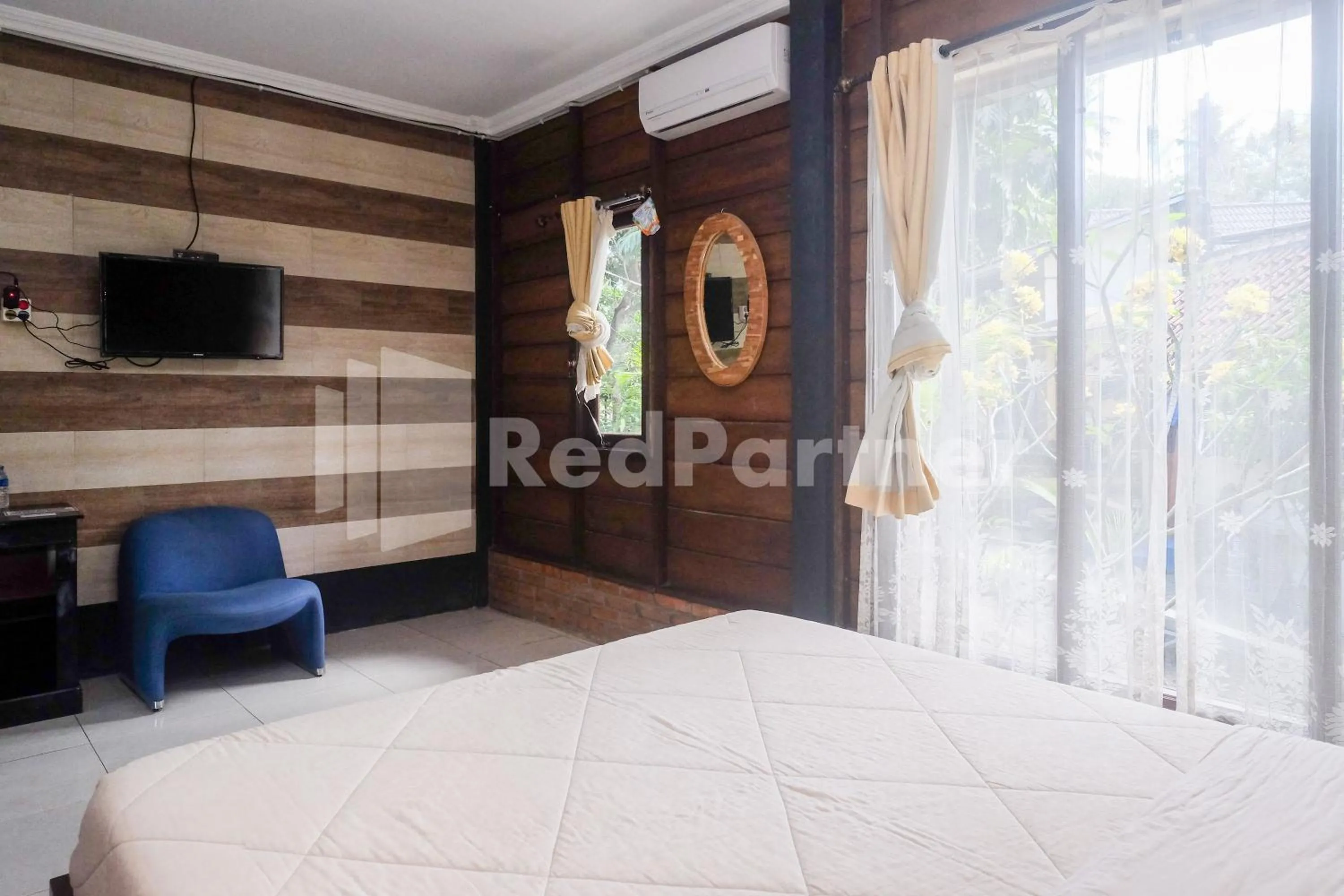 Bed in Kebon Krapyak Cottage Syariah Mitra RedDoorz near Stadion Maguwoharjo