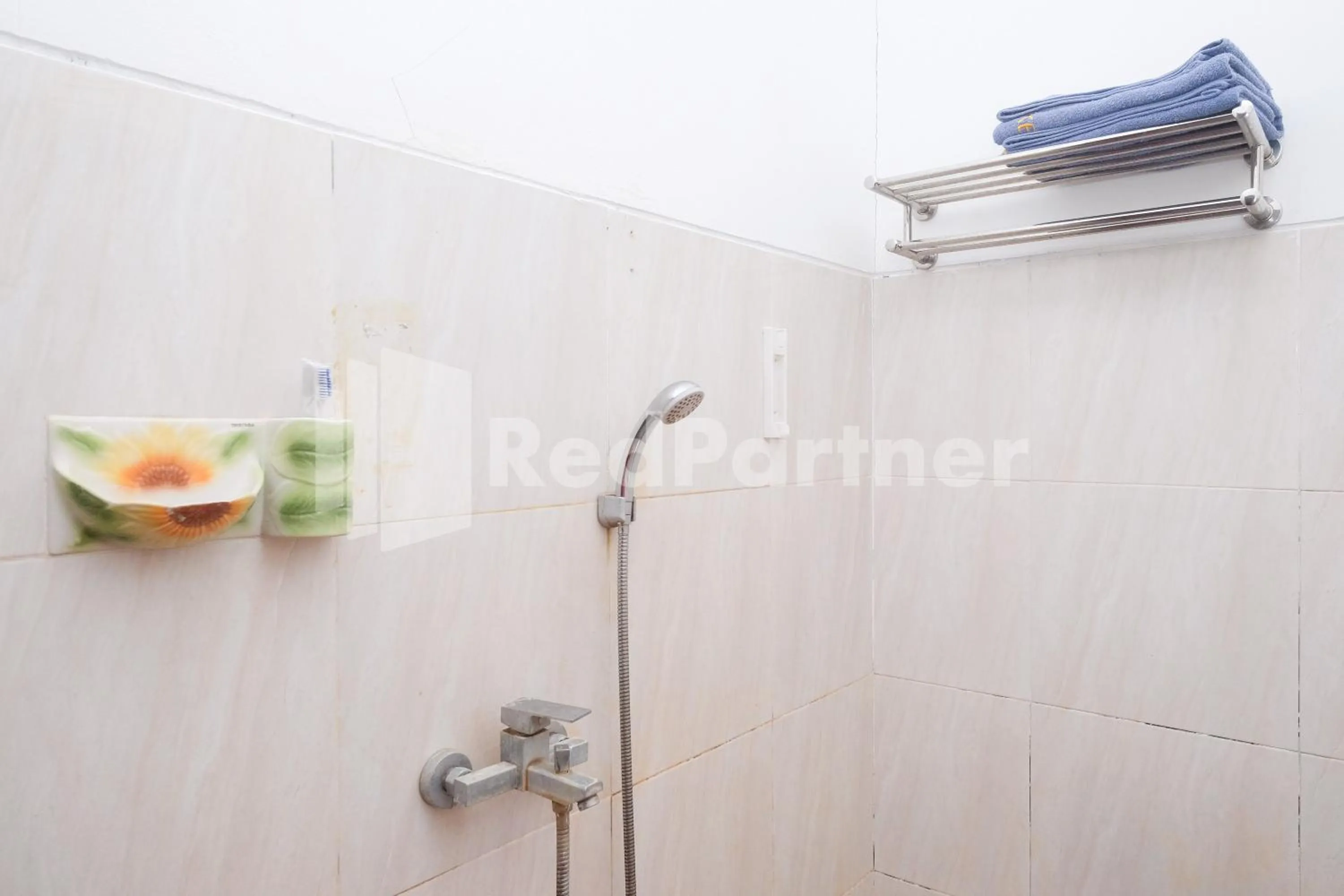 Bathroom in Kebon Krapyak Cottage Syariah Mitra RedDoorz near Stadion Maguwoharjo