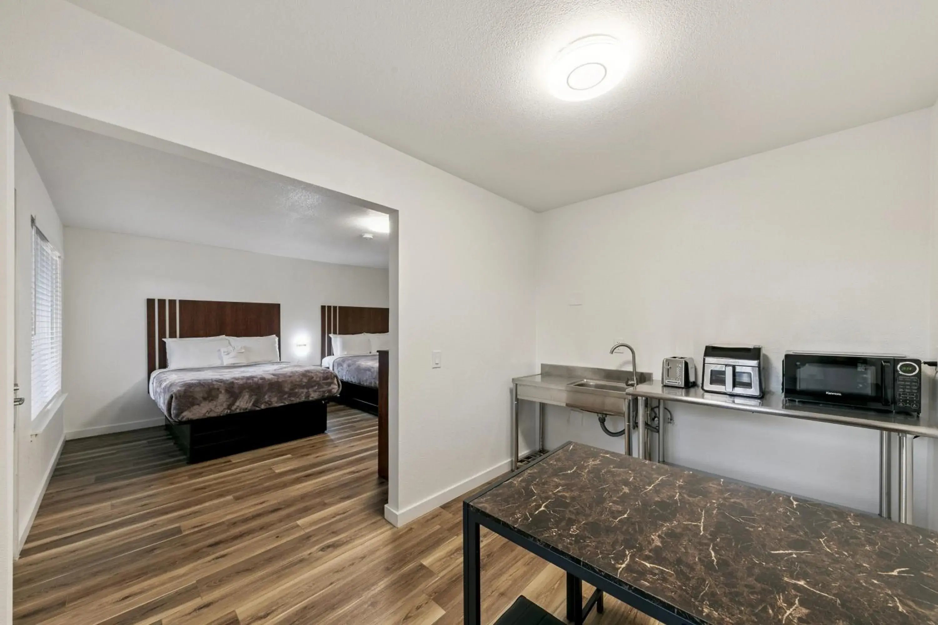 Two Queen Room With Kitchenette in Ambassador Lake Tahoe Two Queen Room With Kitchenette in Ambassador Lake Tahoe