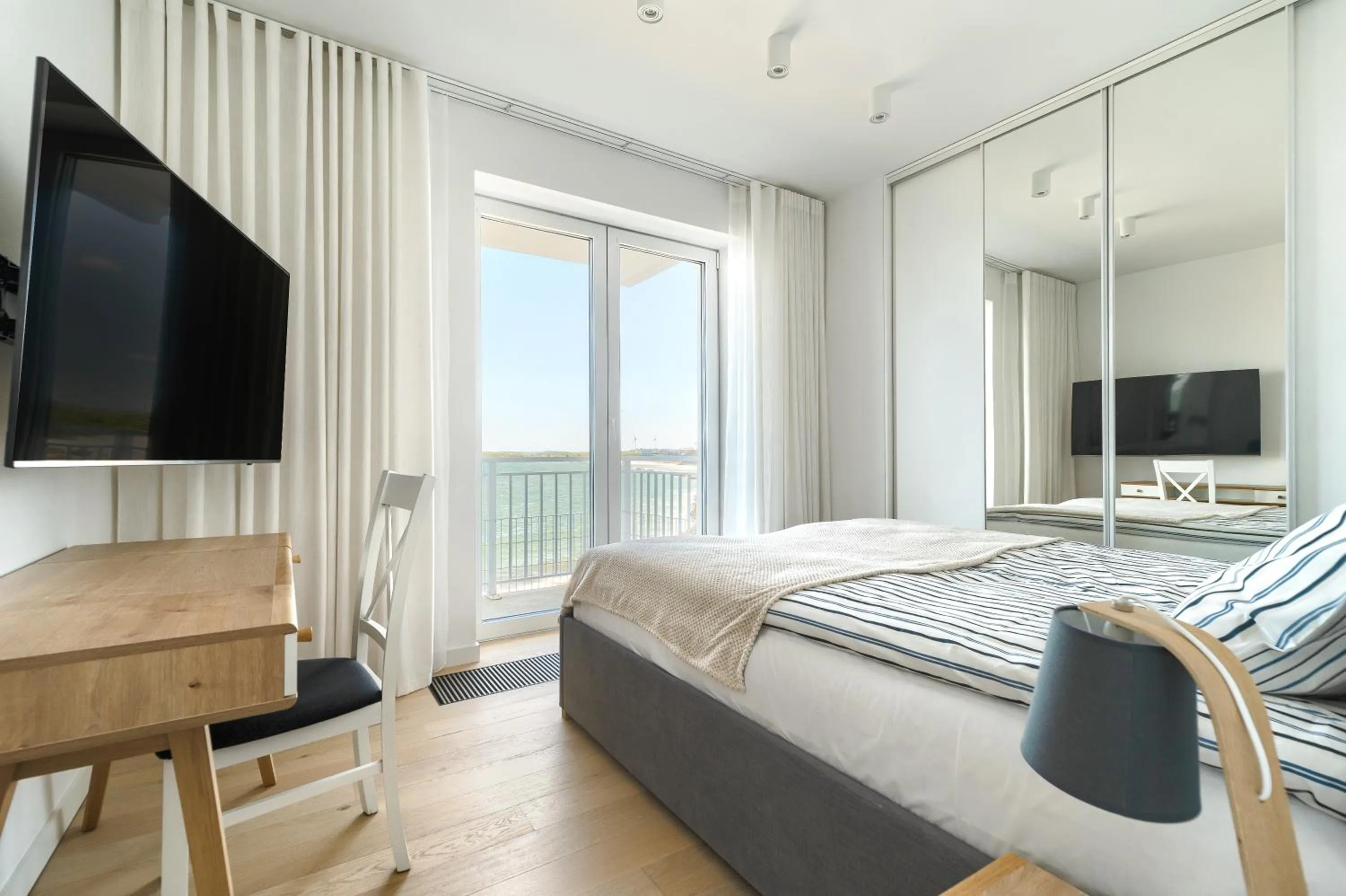 Bed in Apartamenty Marina z widokiem na morze