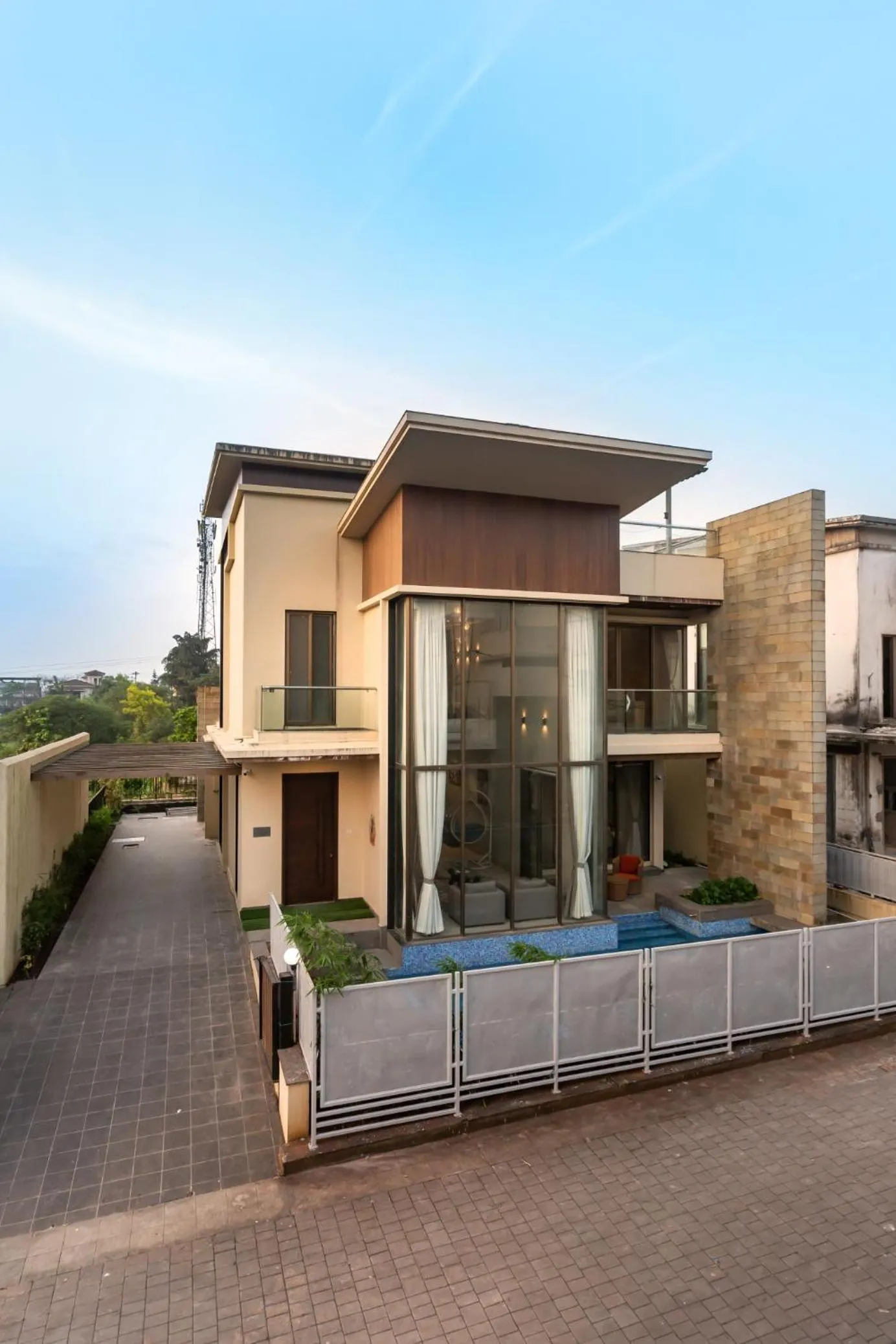 Property building in SaffronStays Aspen, Lonavala - luxury pool villa with games and TV room near Bhushi Dam