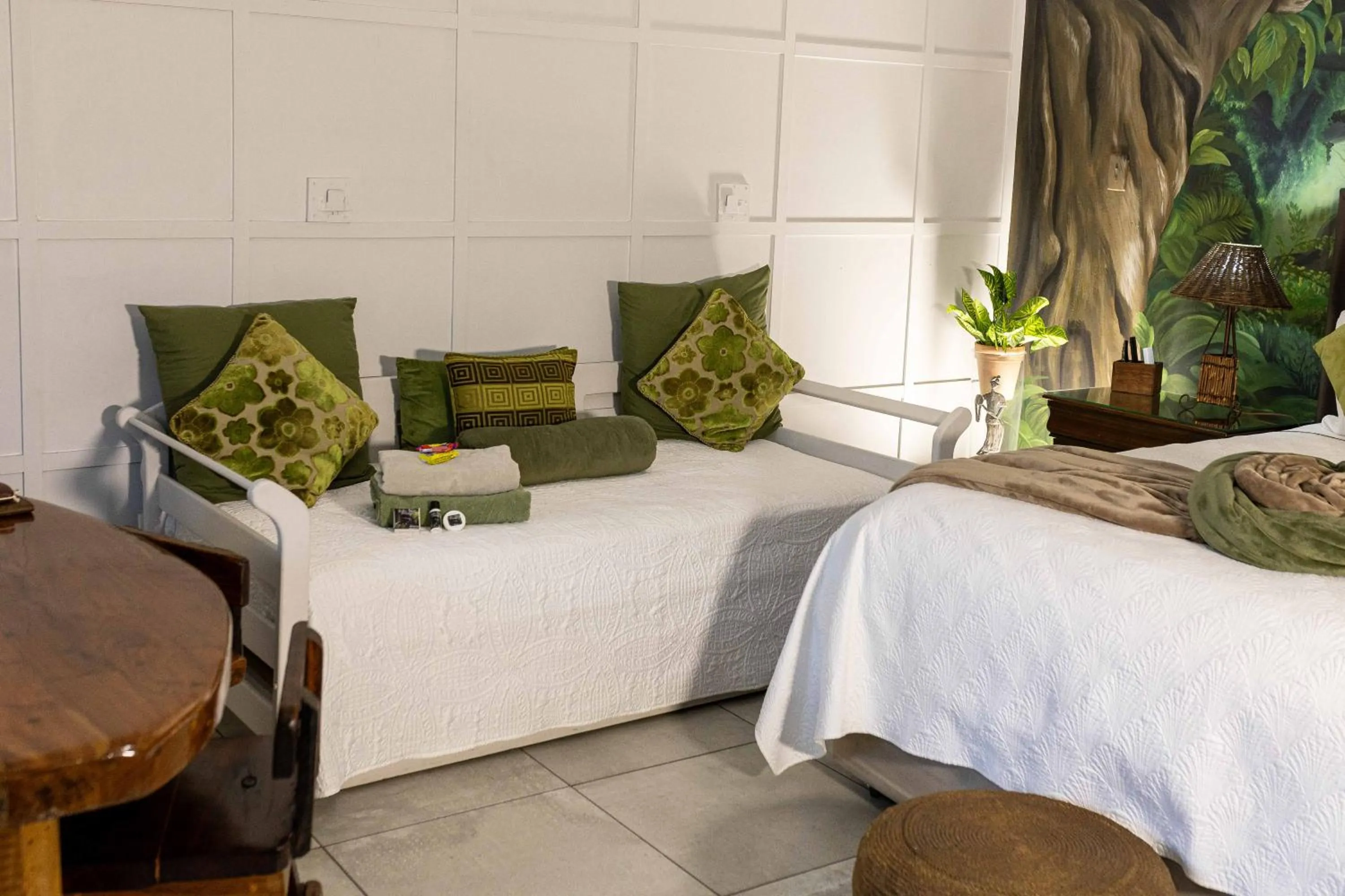 Bed in Rustic Forest Guest House