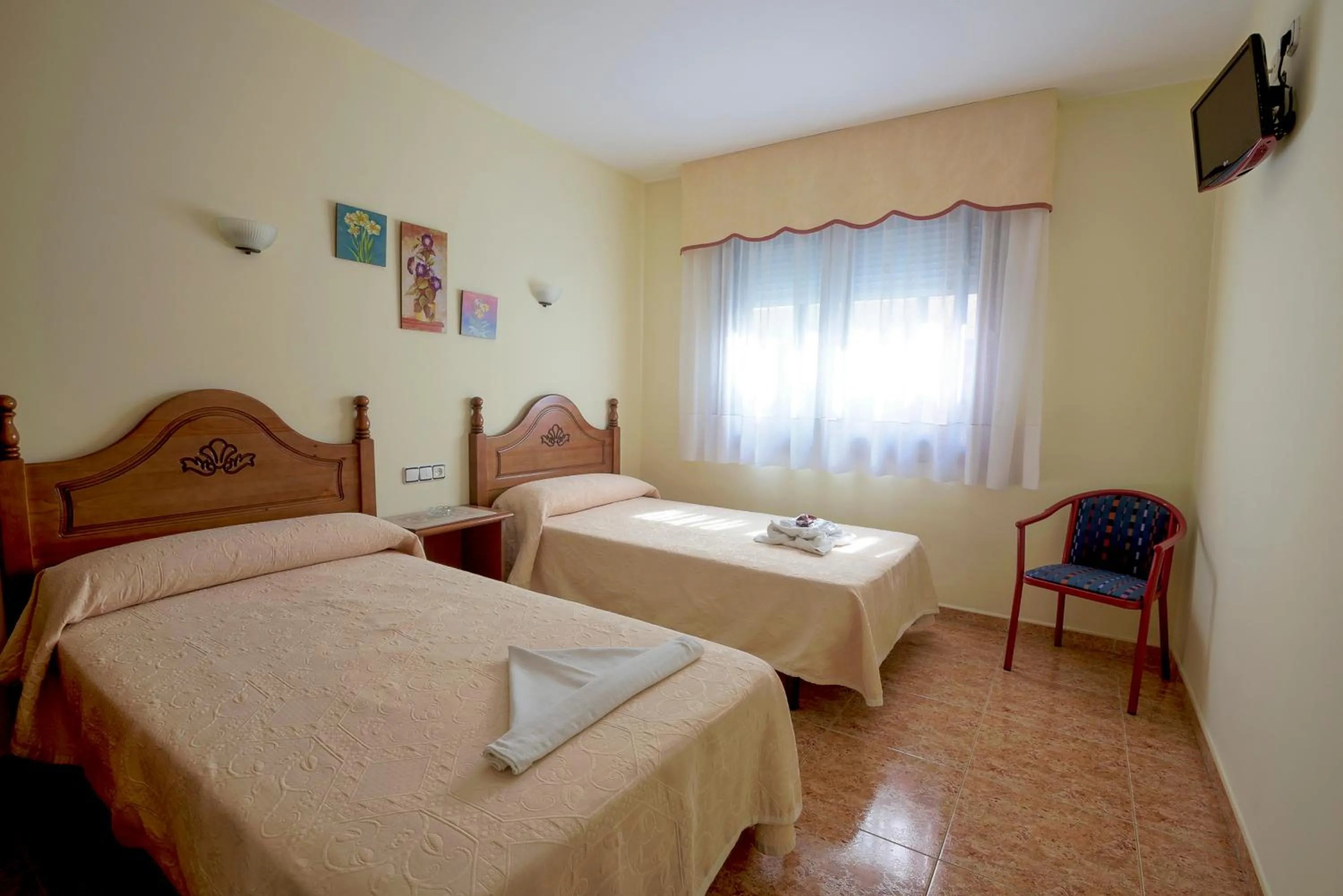 Bed in Hostal O Camouco