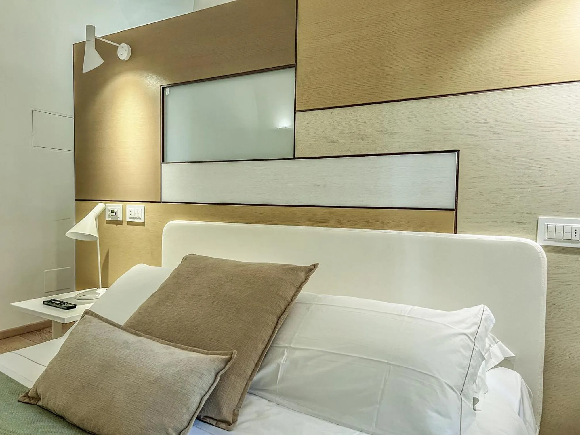 Bed in Santacroce Luxury Rooms