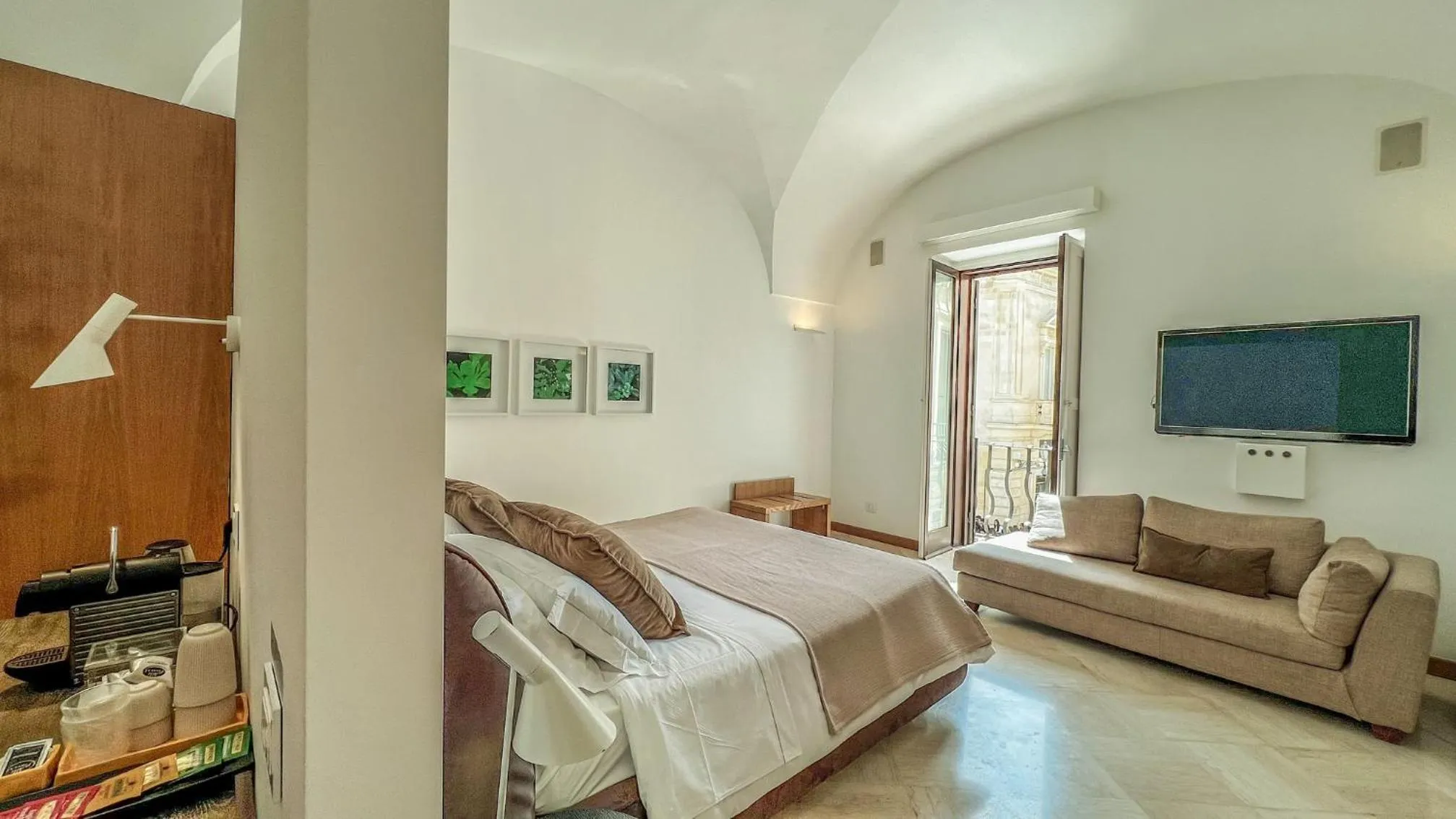 Bed in Santacroce Luxury Rooms