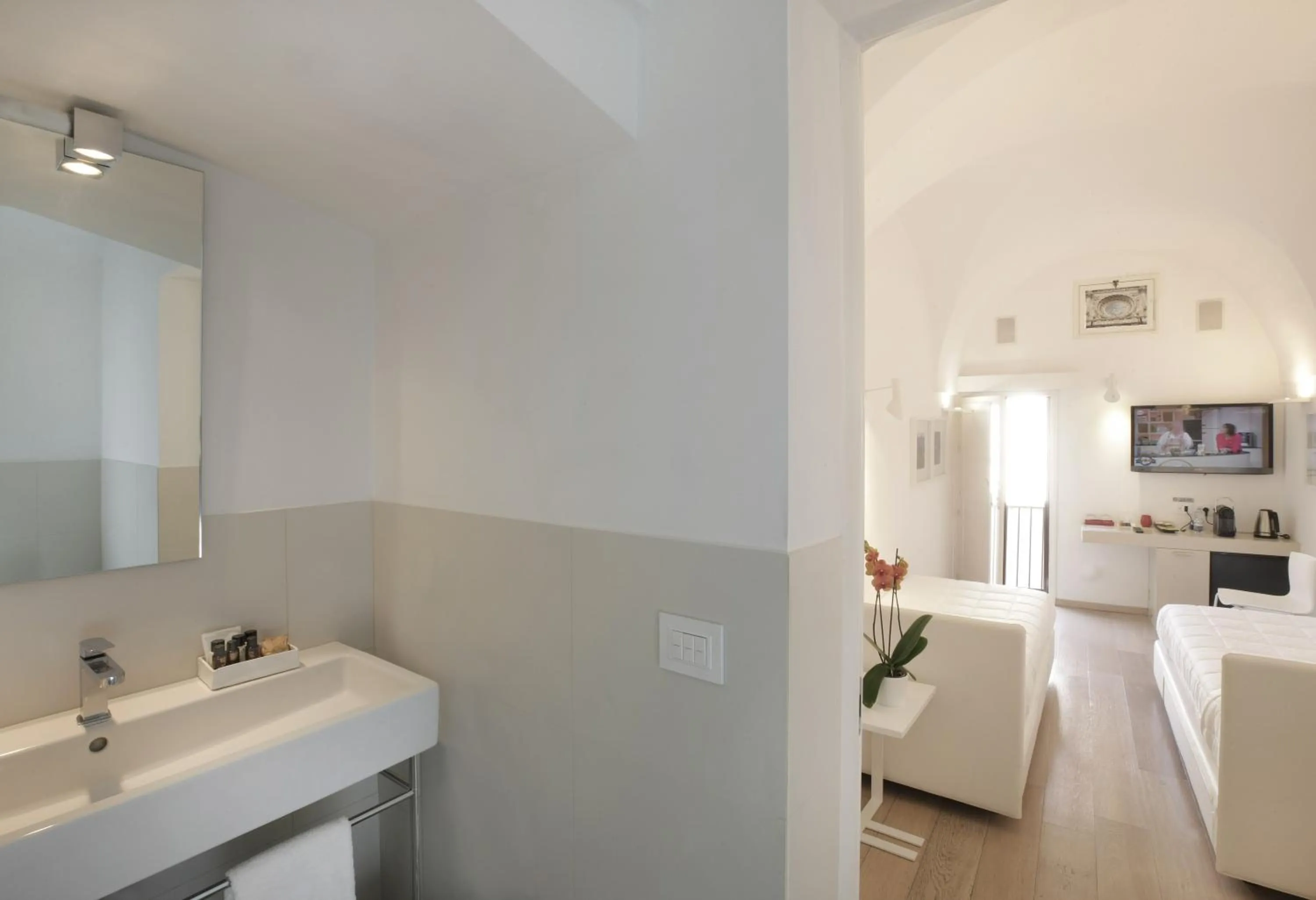 Bed in Santacroce Luxury Rooms