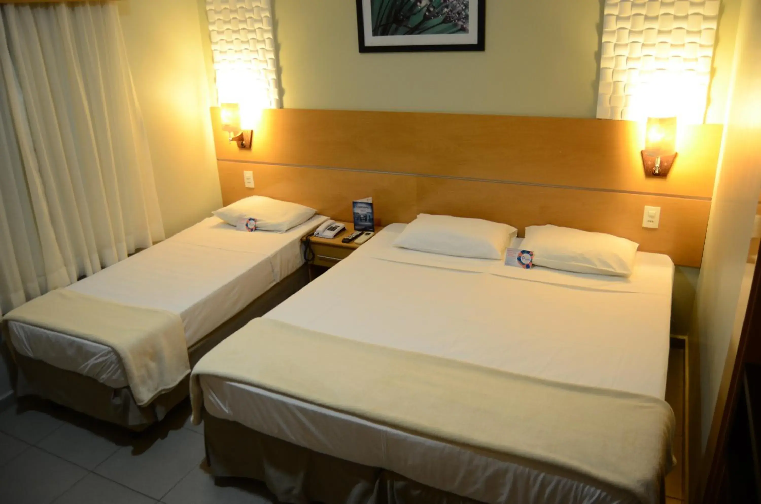 Bed in Limeira Suítes Bed in Limeira Suítes