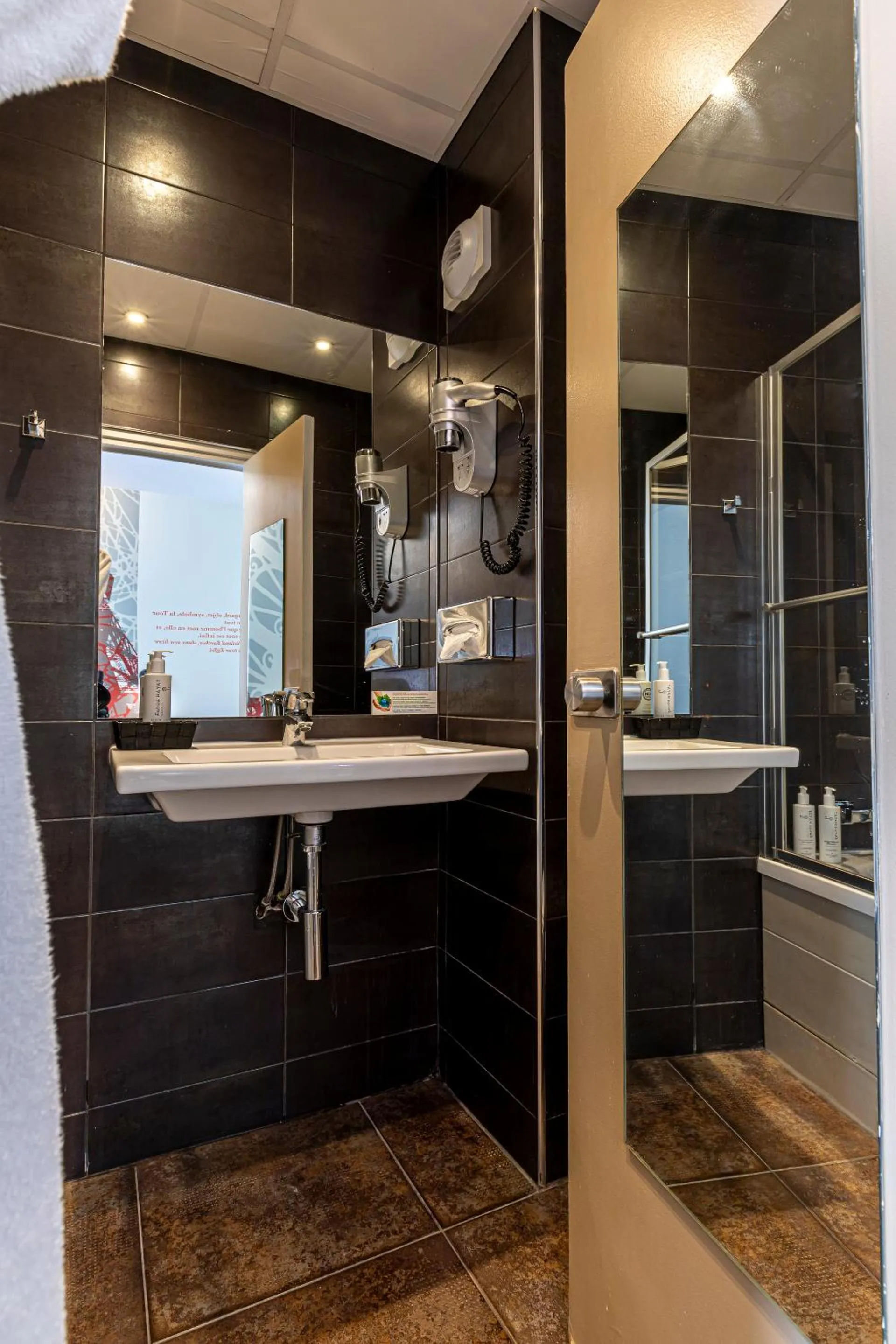 Bathroom in Hotel Alpha Paris Eiffel by Patrick Hayat