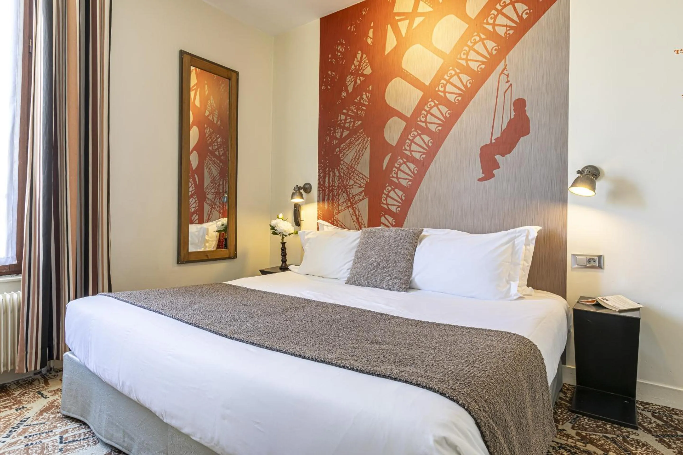 Bed in Hotel Alpha Paris Eiffel by Patrick Hayat