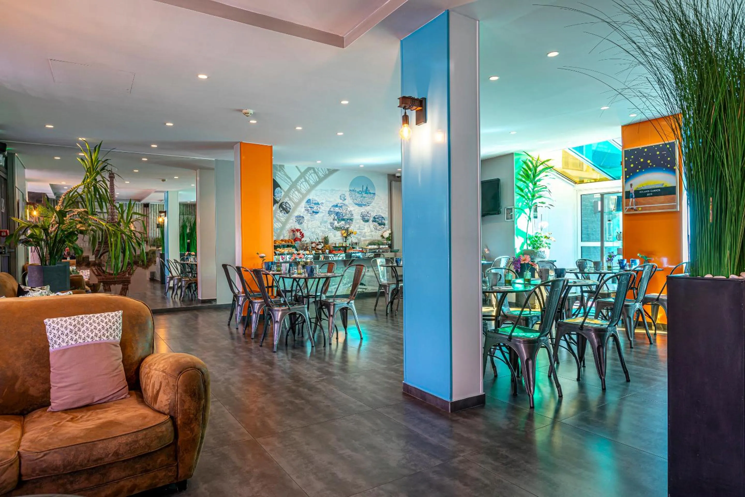 Communal lounge/ TV room in Hotel Alpha Paris Eiffel by Patrick Hayat