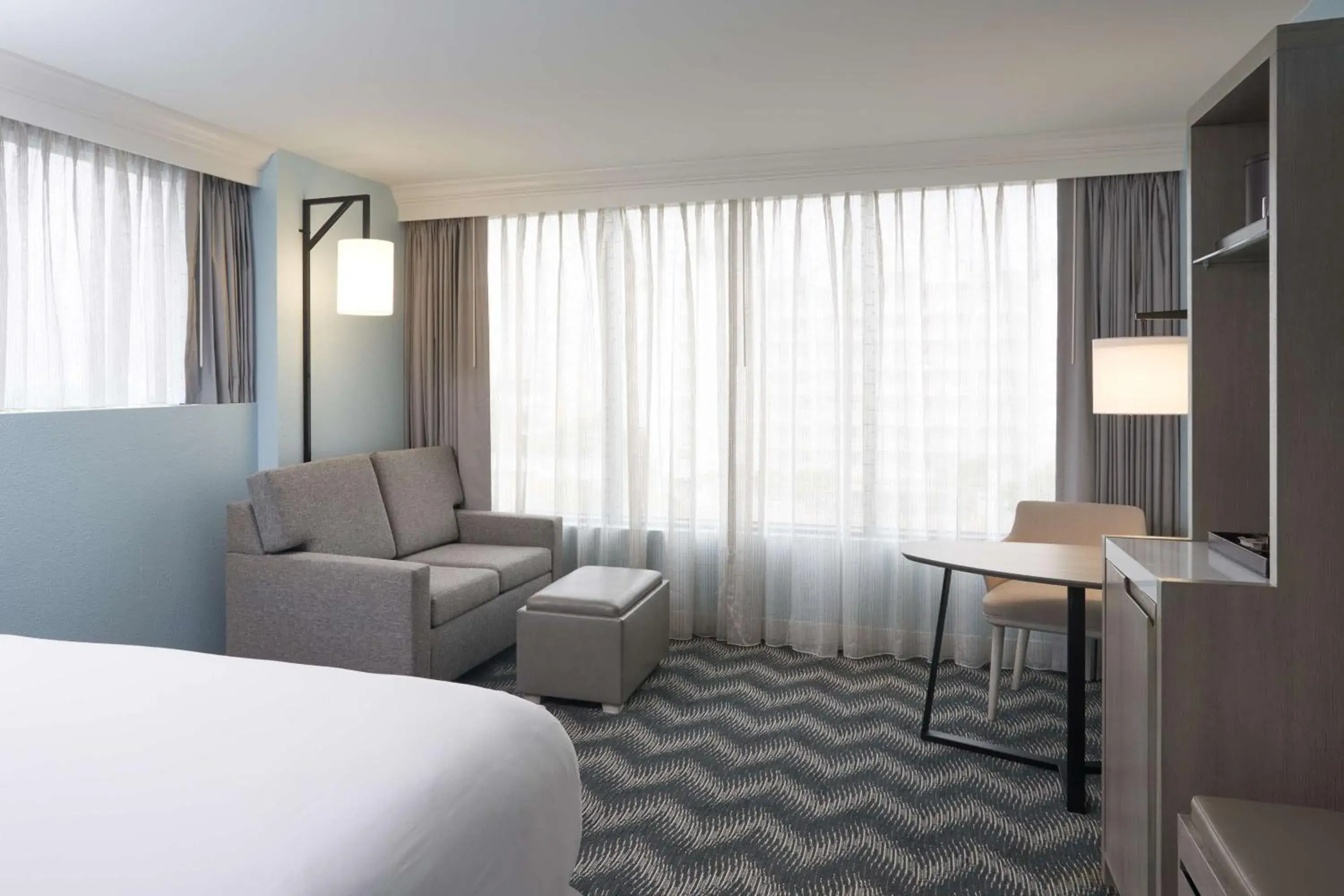 Living room, Bed in Hilton Cocoa Beach Oceanfront Living room, Bed in Hilton Cocoa Beach Oceanfront