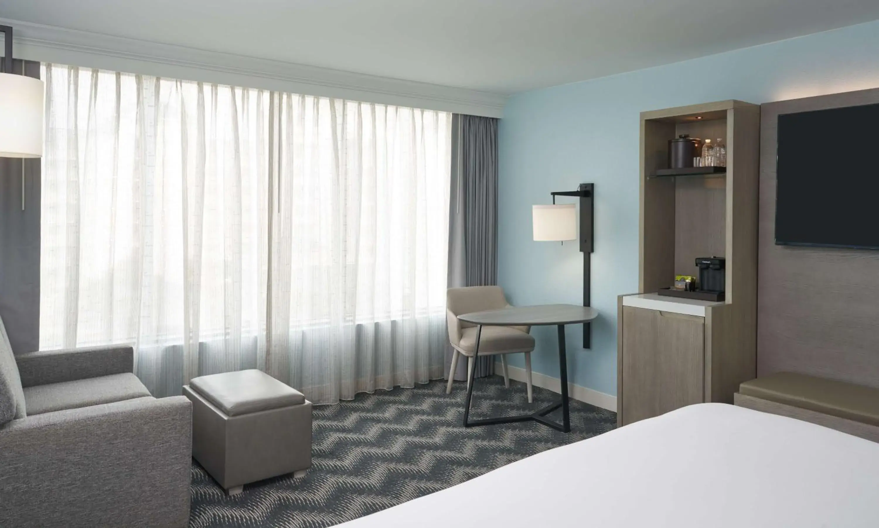 Living room, Bed in Hilton Cocoa Beach Oceanfront Living room, Bed in Hilton Cocoa Beach Oceanfront