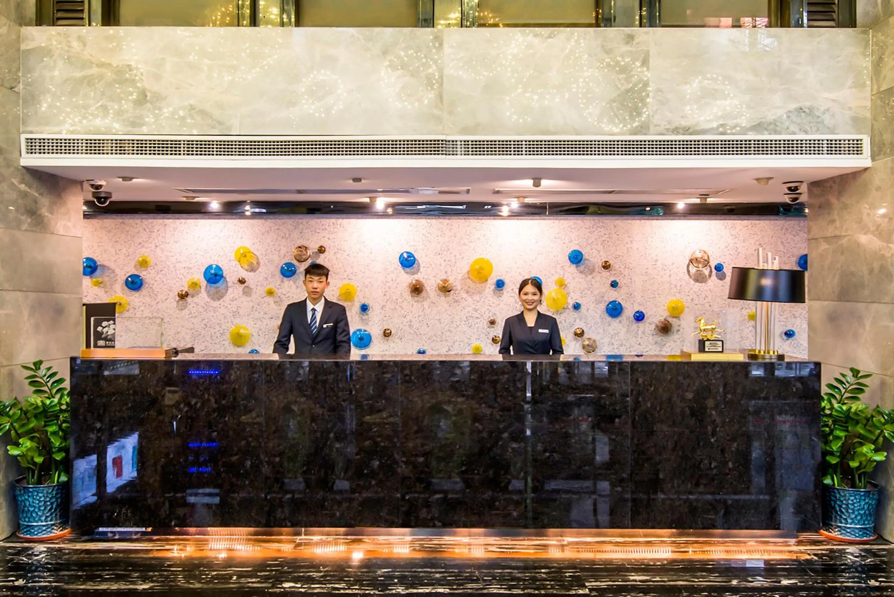 Lobby or reception in La Perle International Hotel