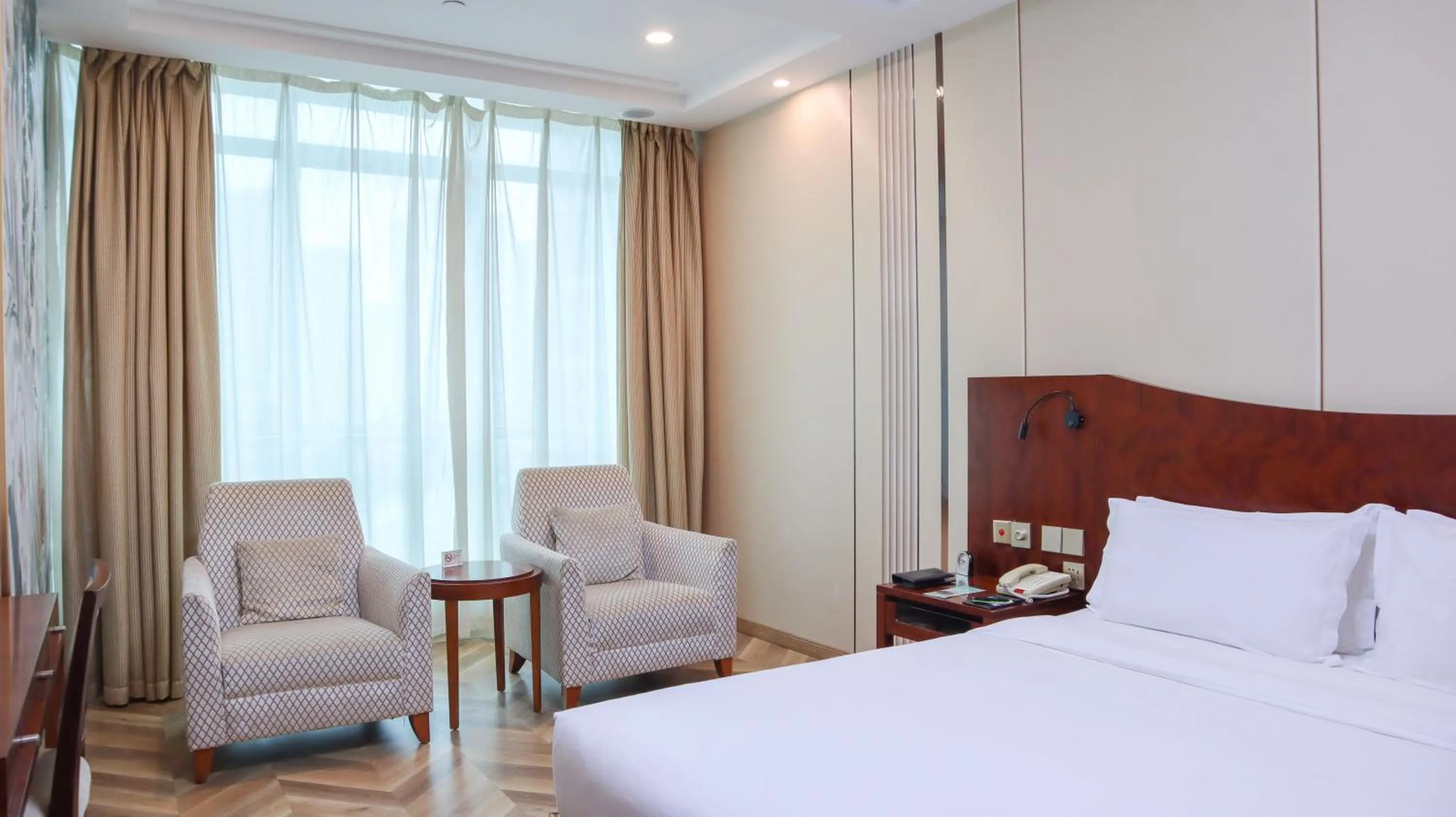 Bed in Shanghai Metropark Jichen Hotel