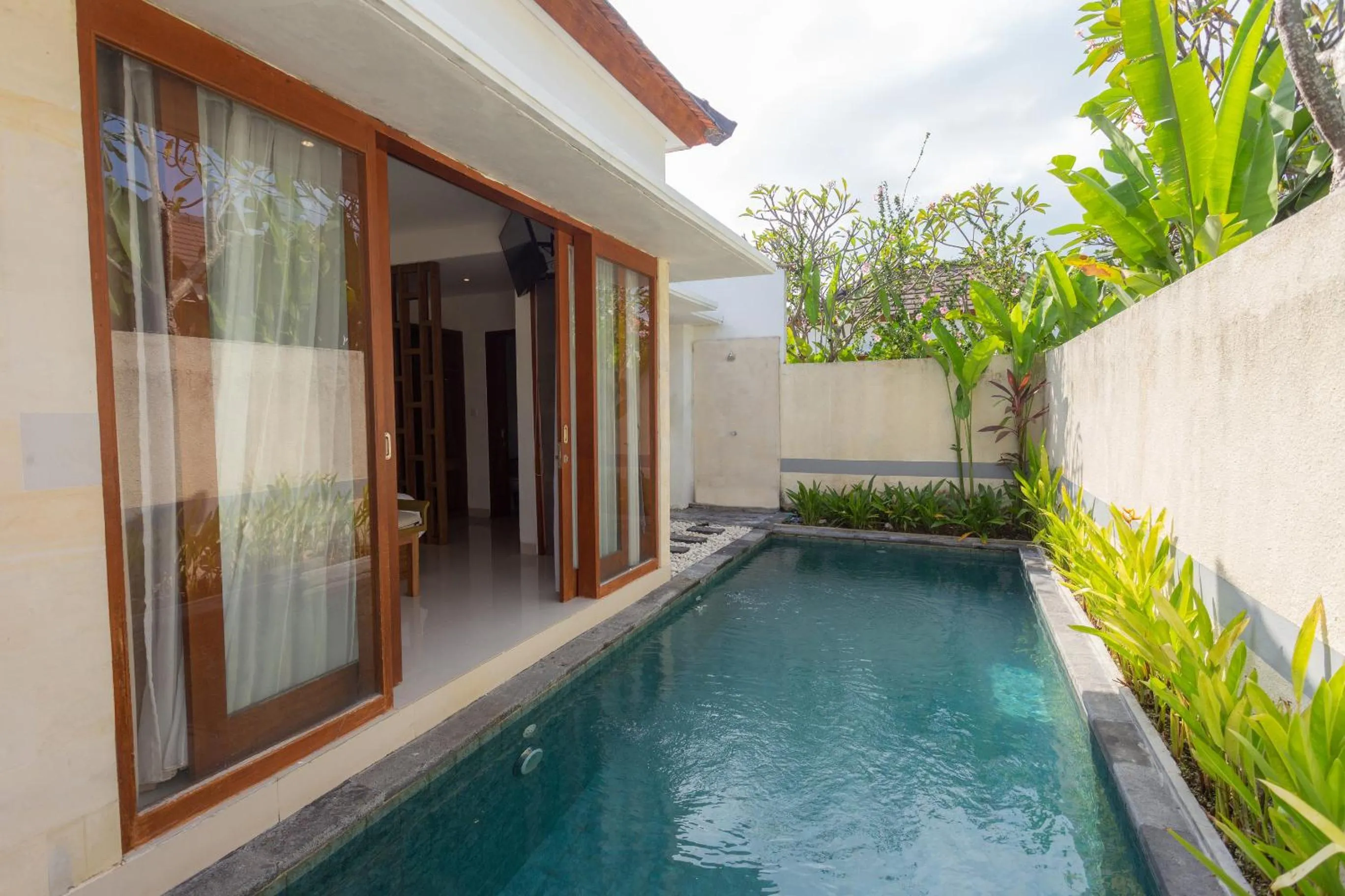Swimming pool in The Sakaye Villas & Spa by Kanaya Hospitality