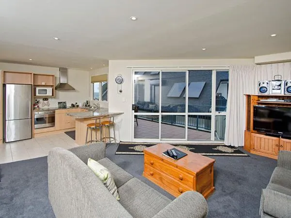 Living room in Pavilion Beachfront Apartments