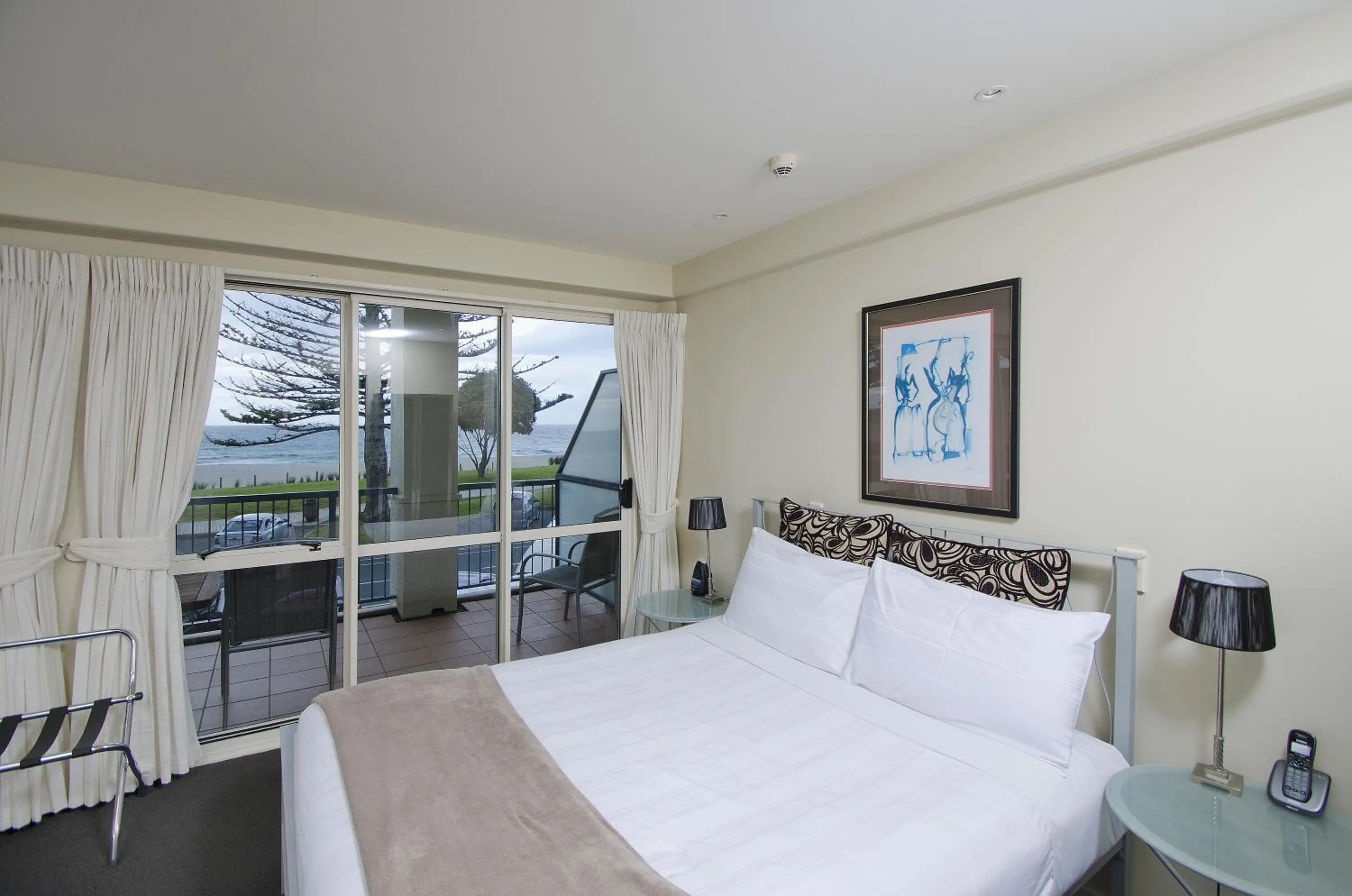 Day, Bed in Pavilion Beachfront Apartments