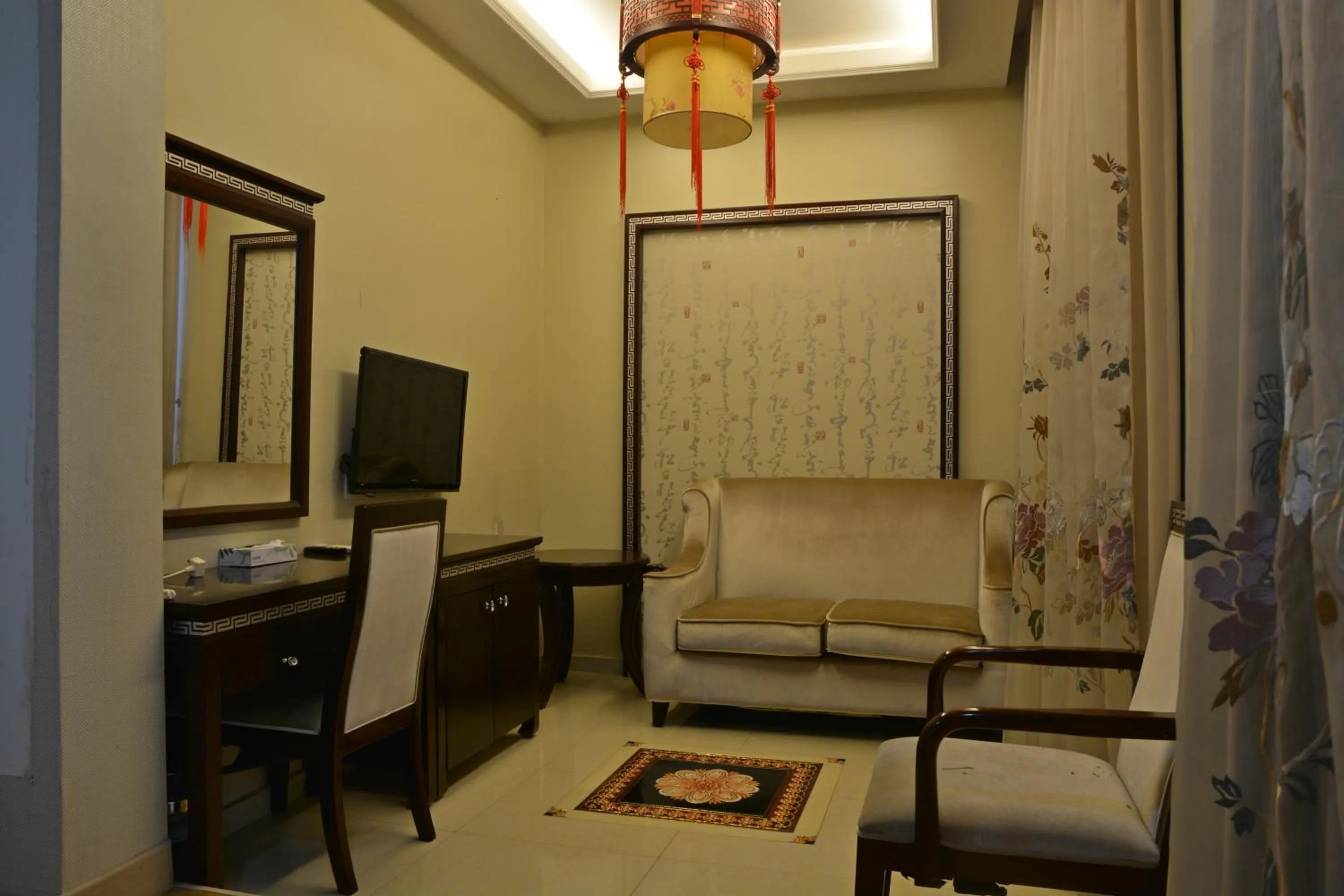 Living room in De Residence Hotel