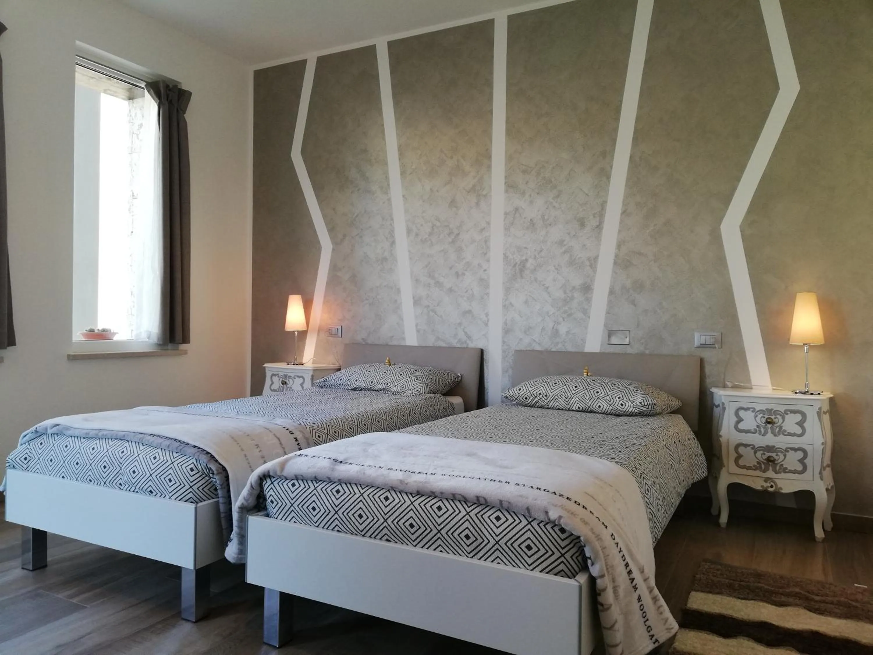 Bed in B&B Villa Pelèr