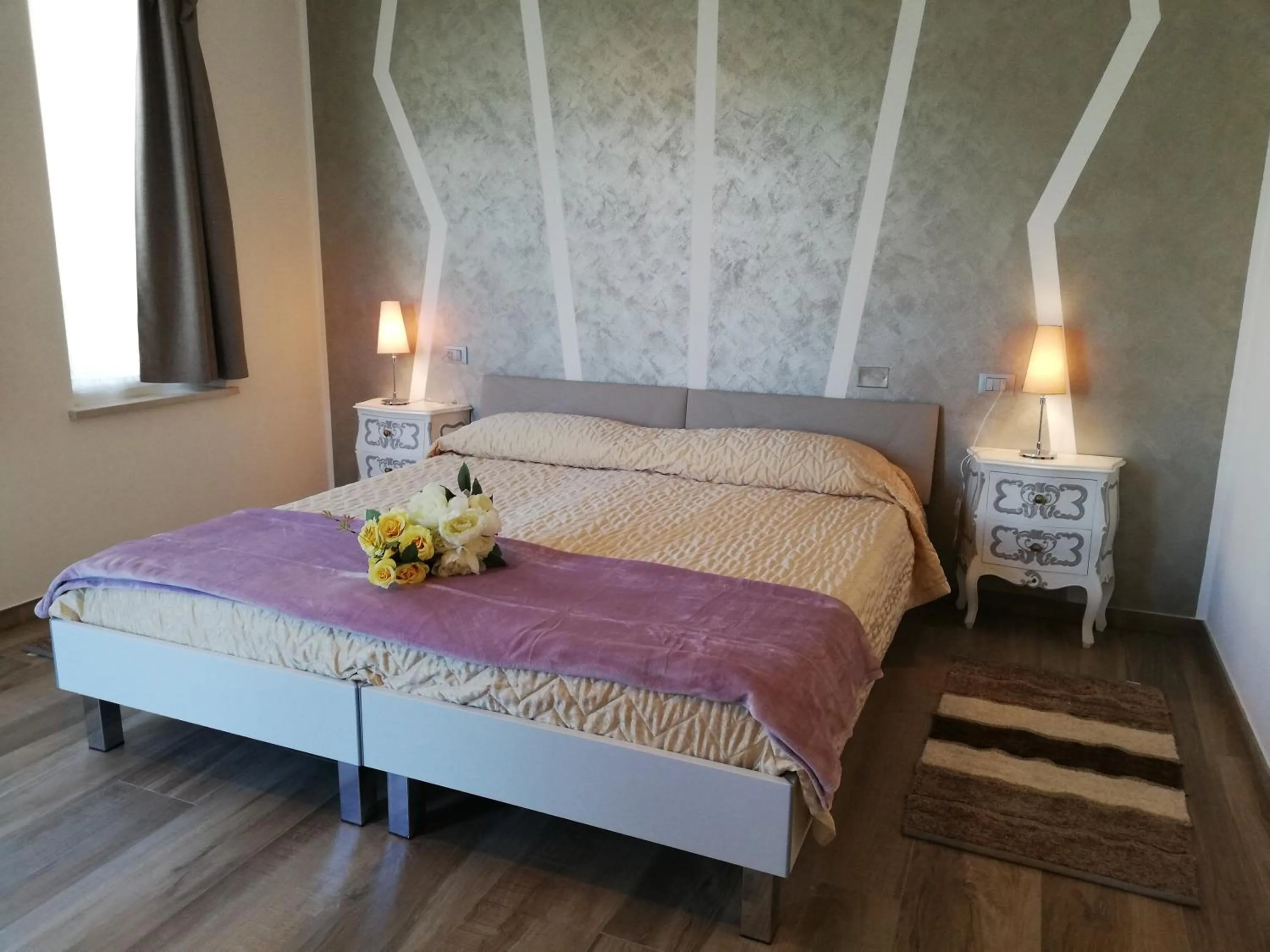 Bed in B&B Villa Pelèr