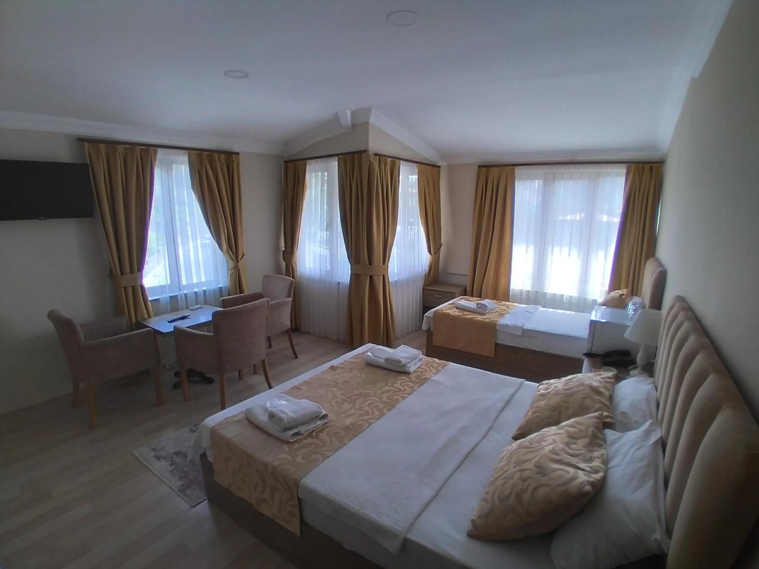 Photo of the whole room, Bed in NEW BEYLERBEYİ HOTEL