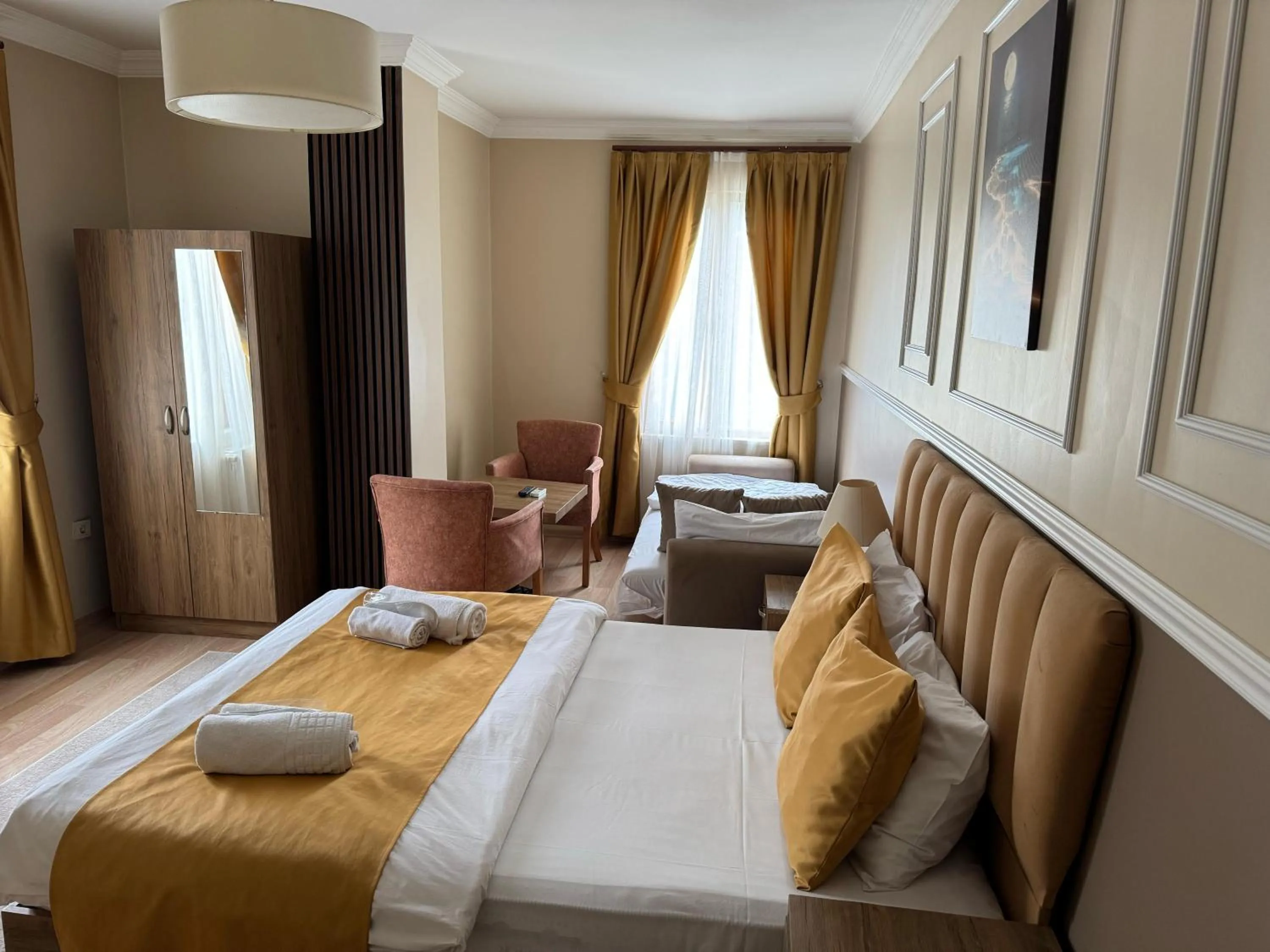 Bed in NEW BEYLERBEYİ HOTEL