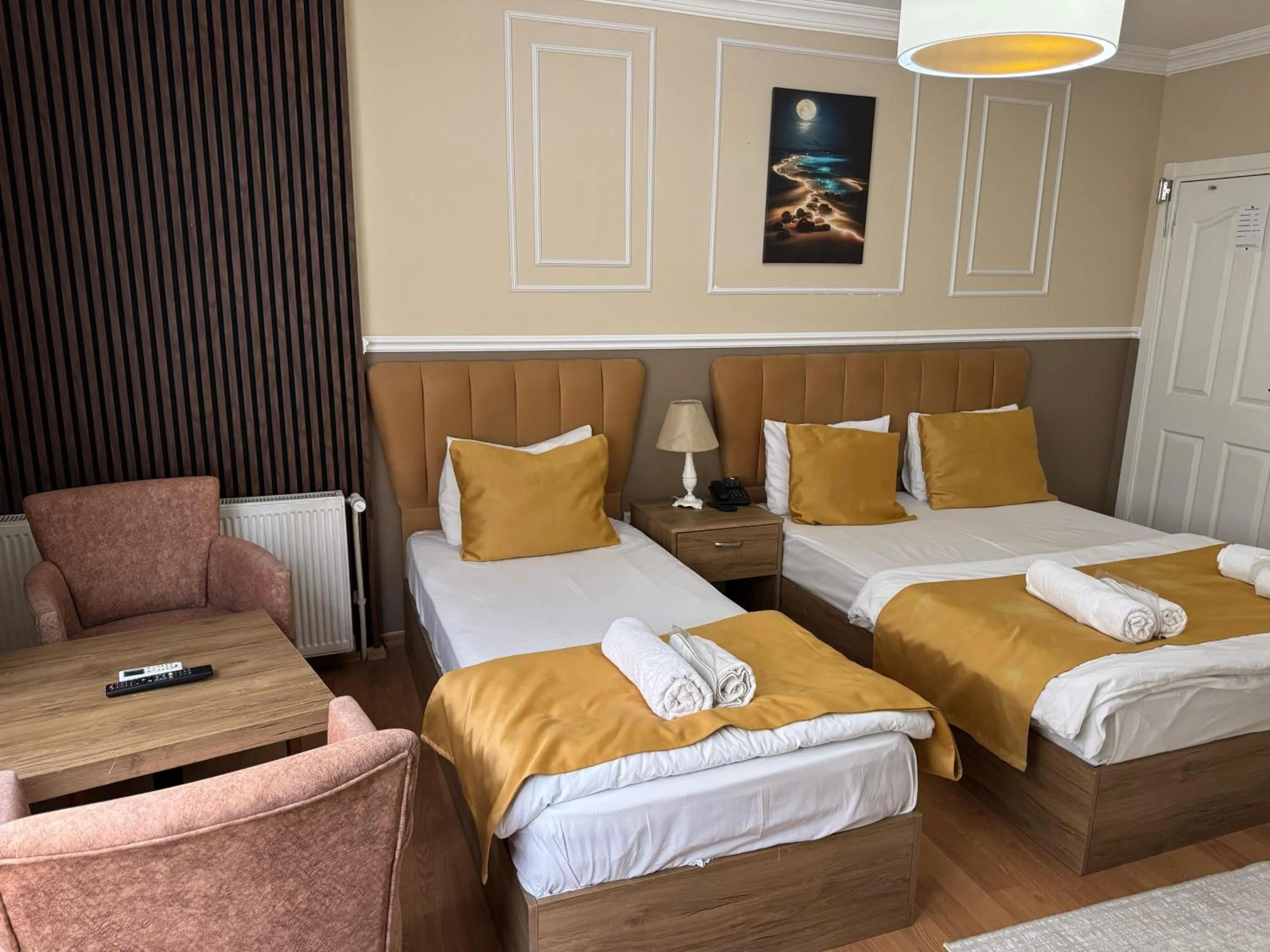 Bed in NEW BEYLERBEYİ HOTEL