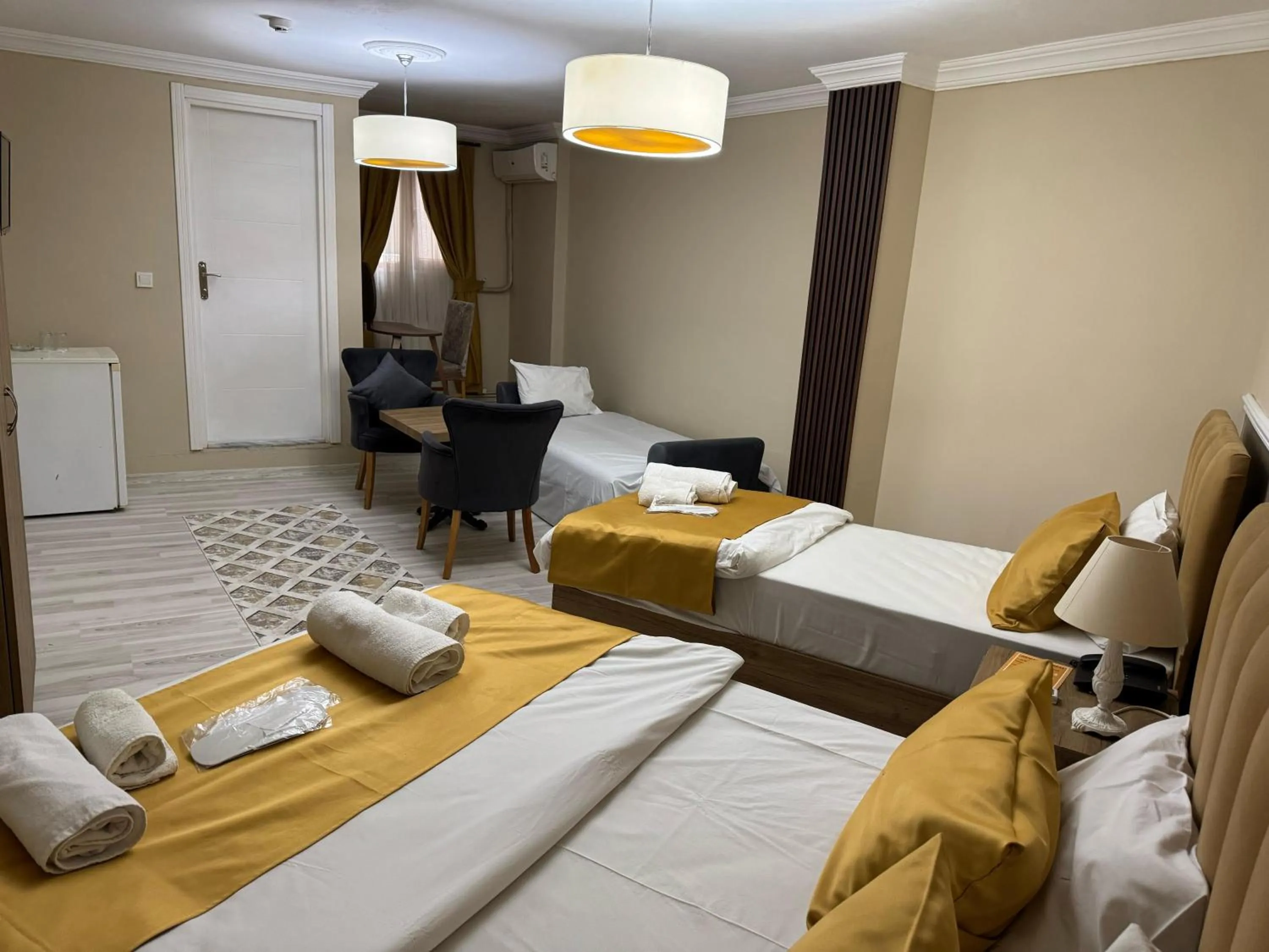 Bed in NEW BEYLERBEYİ HOTEL