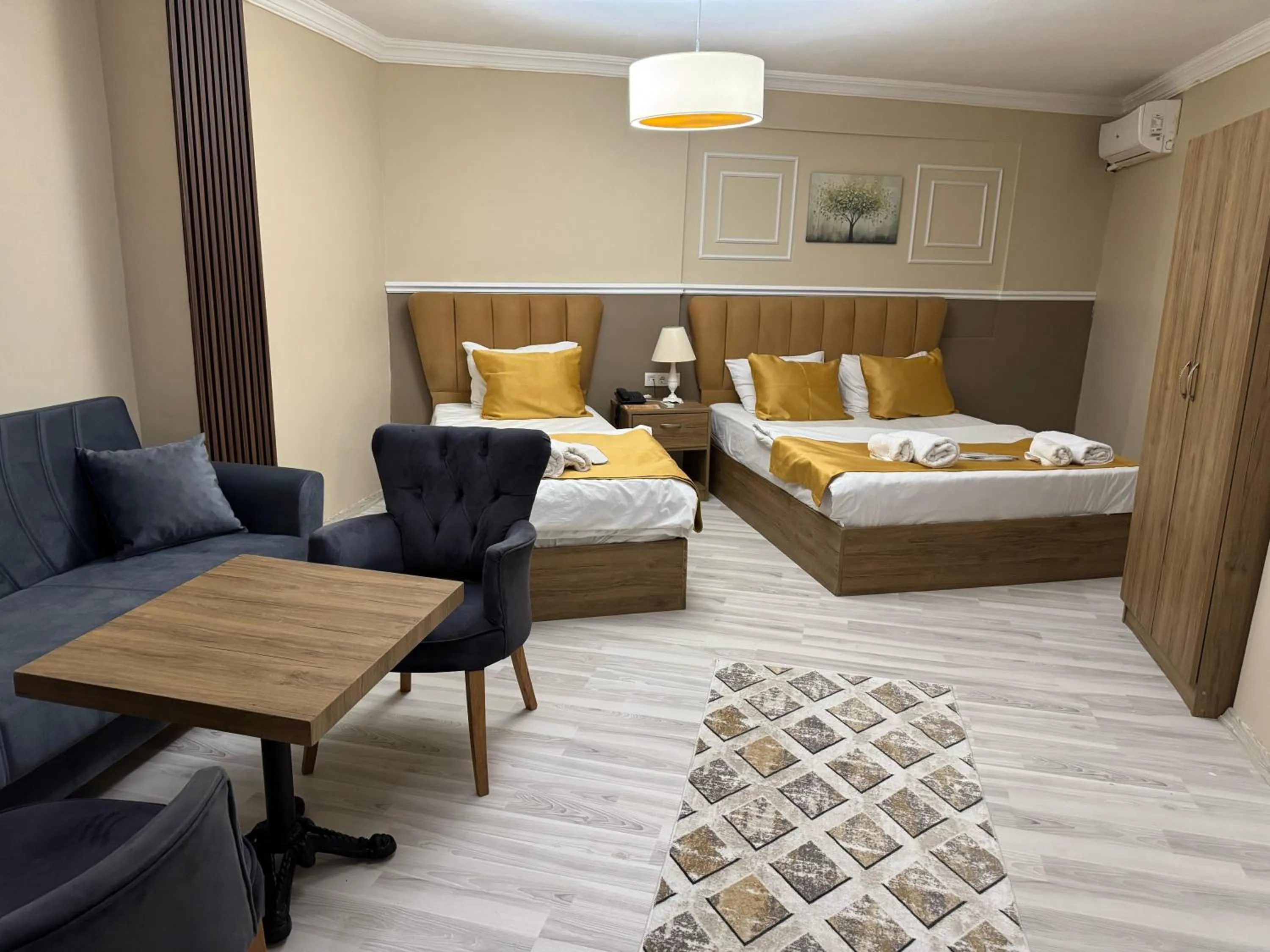 Bed in NEW BEYLERBEYİ HOTEL