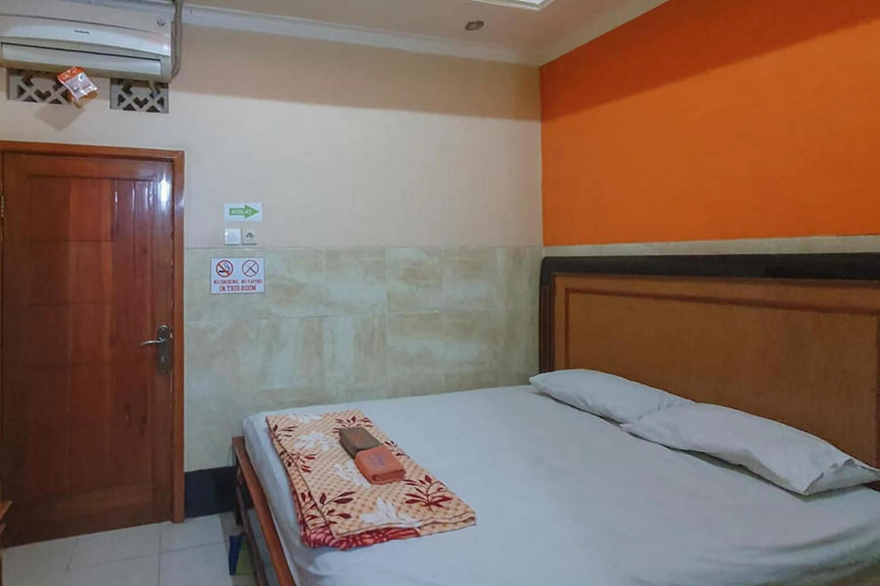 Bed in Homestay Gayatri Sawojajar near Univ Negeri Malang Kampus 2 Mitra RedDoorz