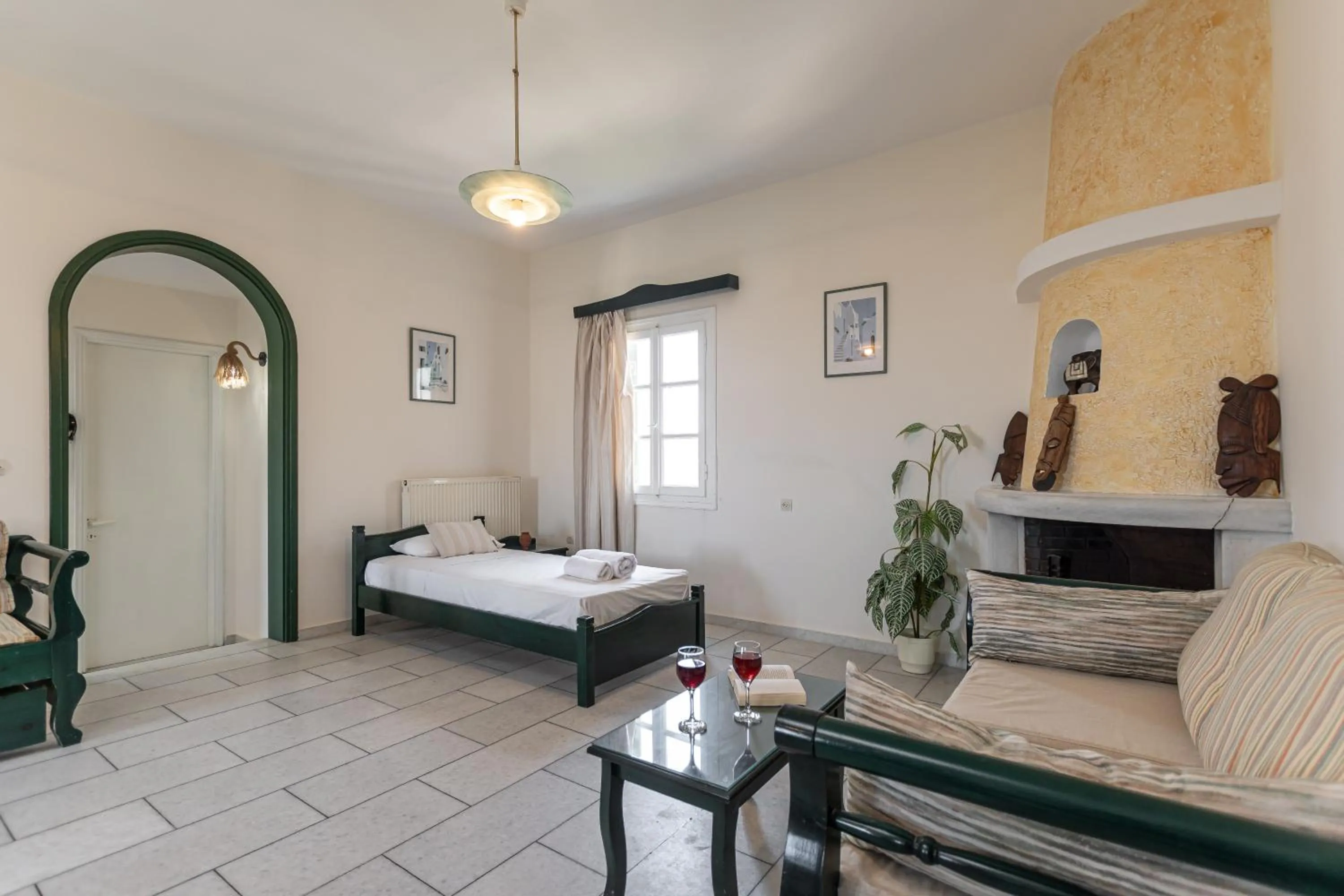 Living room, Bed in Studios Vrettos Beachfront Hotel