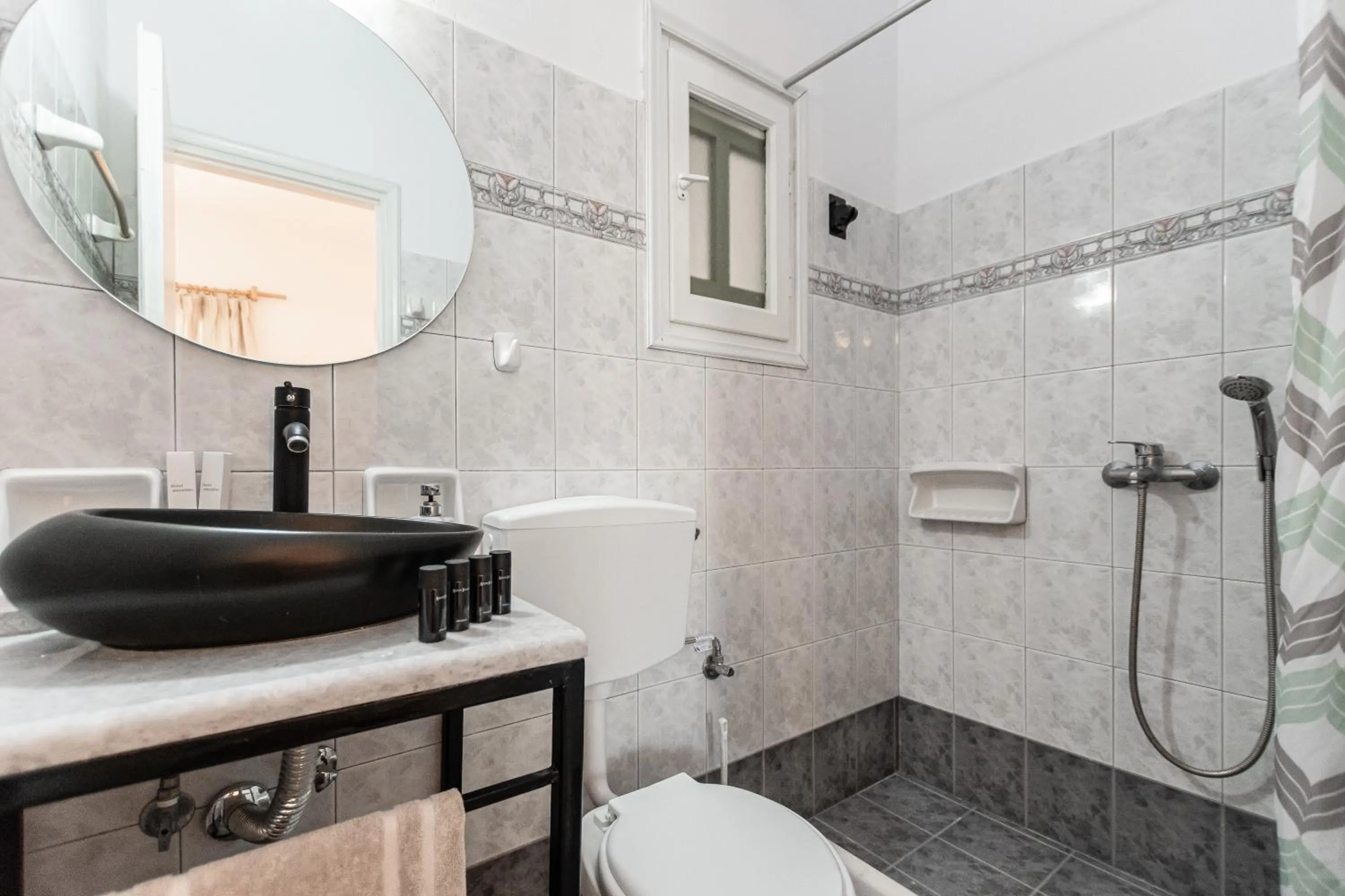 Bathroom in Studios Vrettos Beachfront Hotel