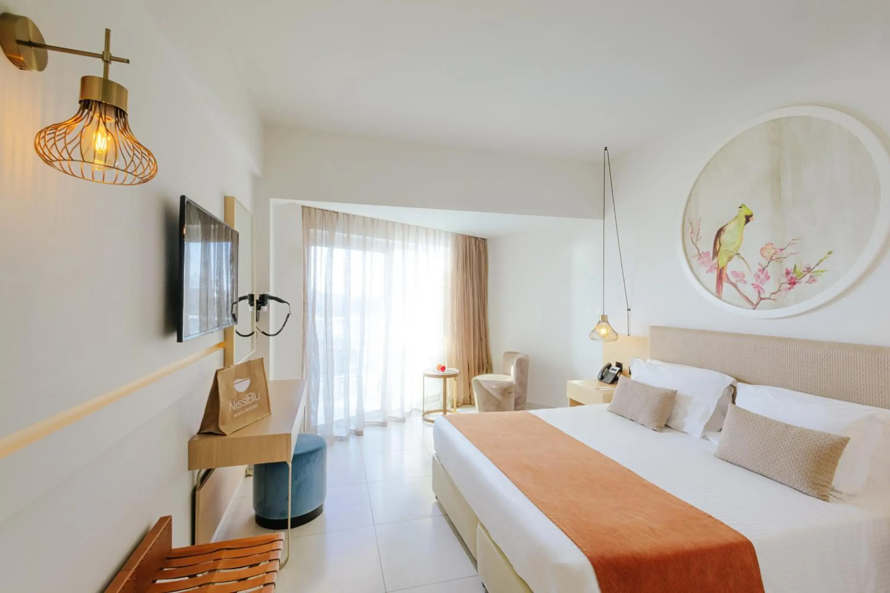 Bed in NissiBlu Beach Resort Bed in NissiBlu Beach Resort