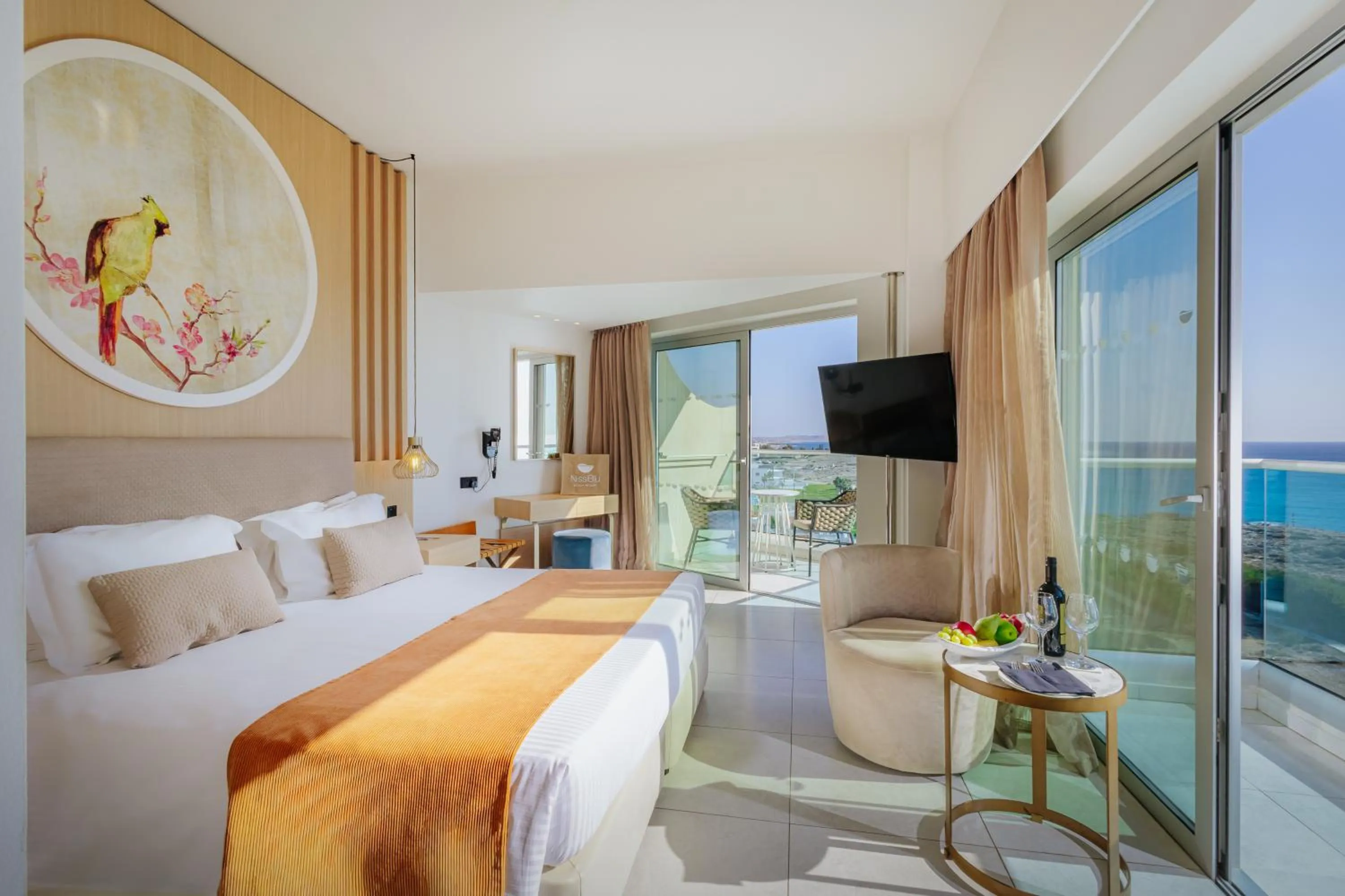 Bed in NissiBlu Beach Resort