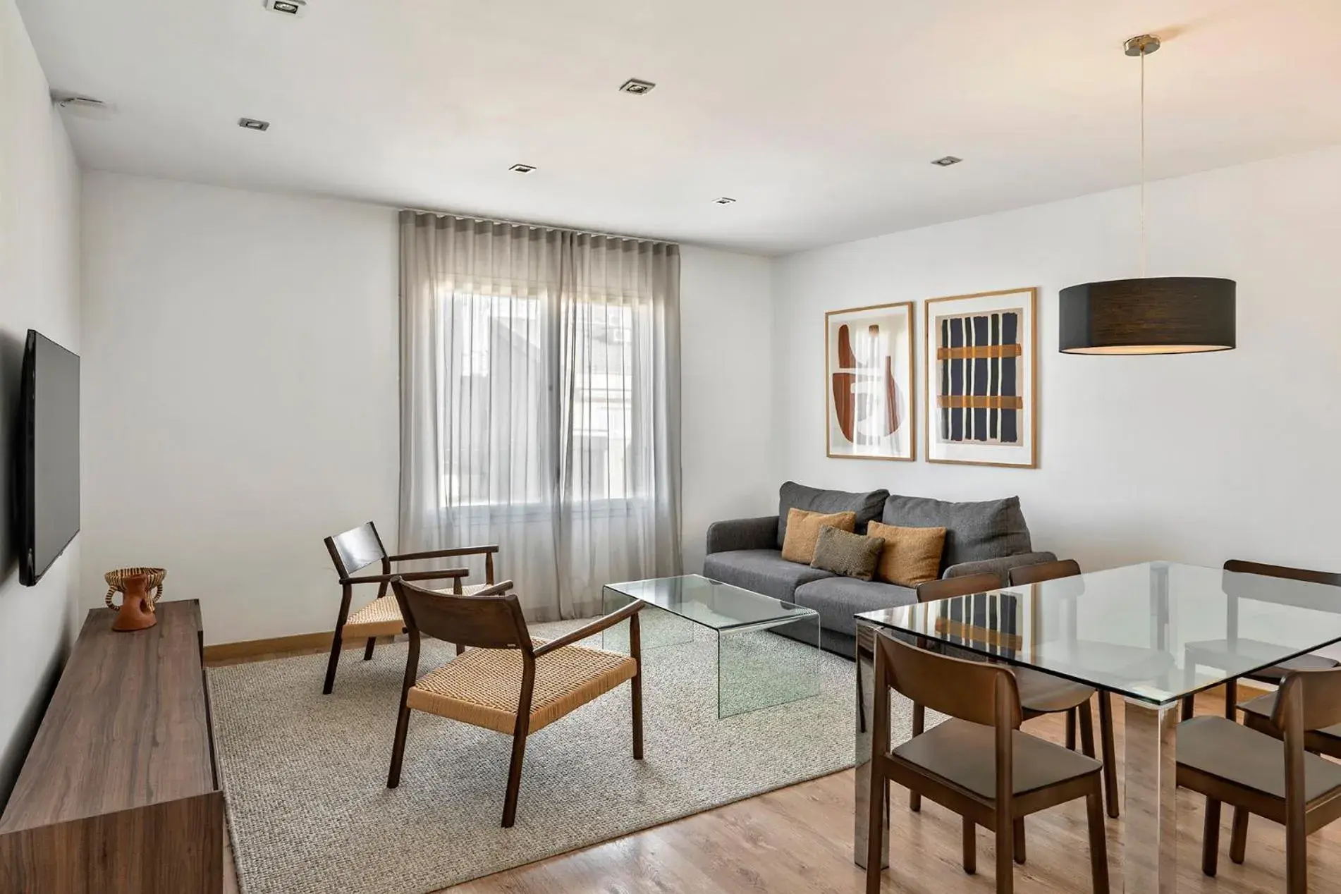 Living room in The Corner Apartments by Aspasios Living room in The Corner Apartments by Aspasios