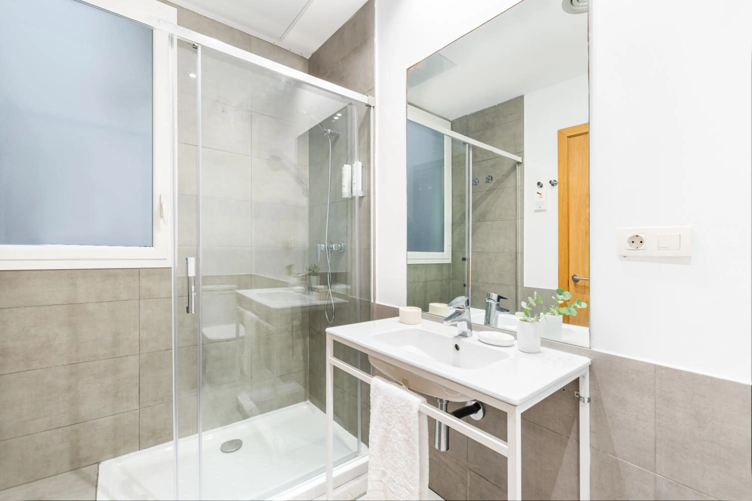 Bathroom in The Corner Apartments by Aspasios