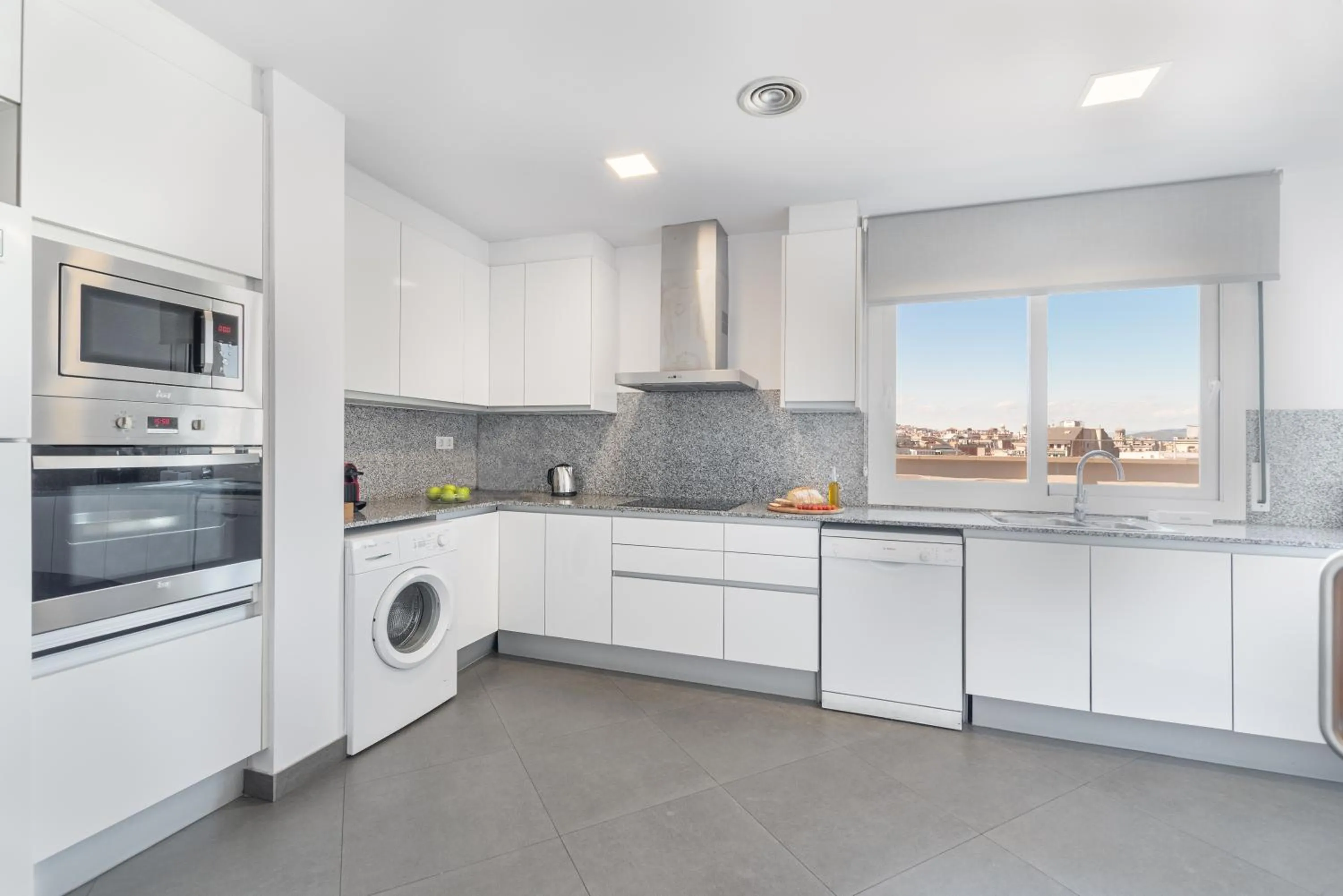 Kitchen or kitchenette in The Corner Apartments by Aspasios