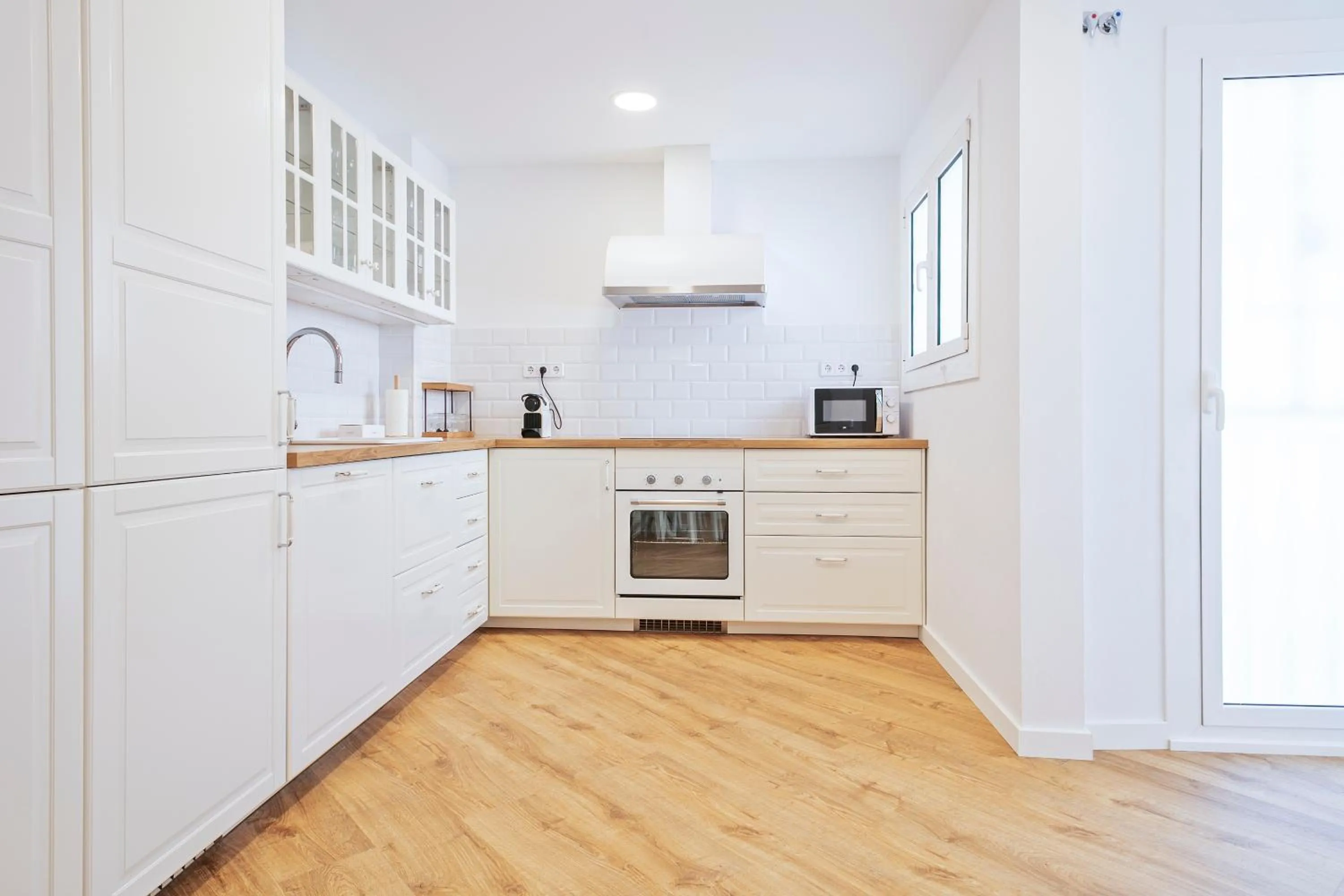 kitchen in The Corner Apartments by Aspasios